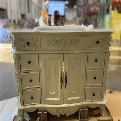 DALLAS LOCATION - Home Decorators Collection Winslow 48 in. W x 22 in. D x 35 in. H Single Sink Freestanding Bath Vanity in Antique White with White Marble Top