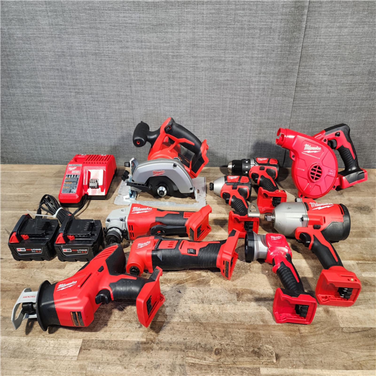 HOUSTON LOCATION - AS-IS Milwaukee M18 18-Volt Lithium-Ion Cordless Combo Kit (9-Tool) with (2) Batteries  Charger  and Tool Bag