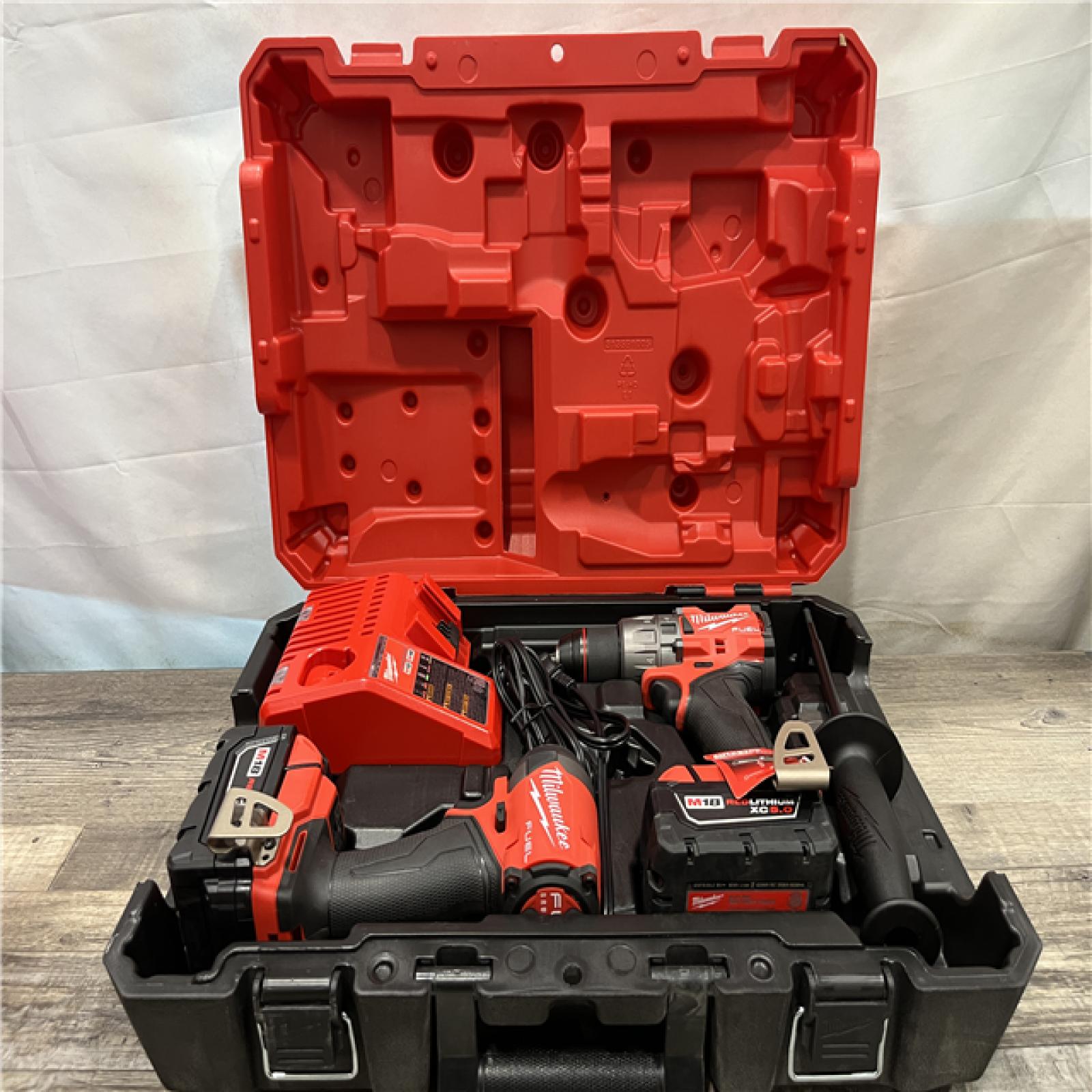 AS-IS Milwaukee FUEL 18V Lithium-Ion Brushless Cordless Hammer Drill and Impact Driver Combo Kit