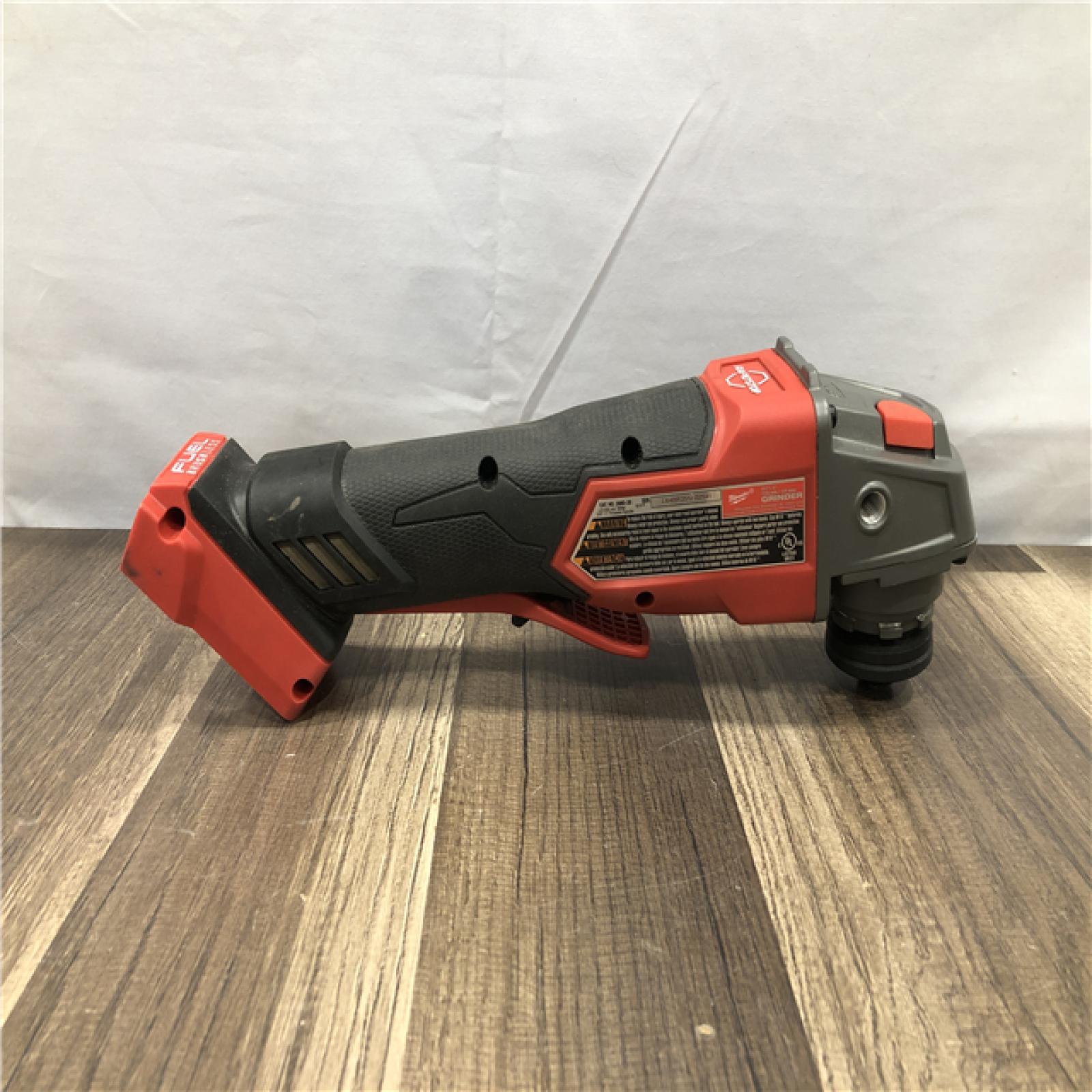 AS-IS Milwaukee FUEL 18V Lithium-Ion Brushless Cordless 4-1/2 in./5 in. Grinder w/Paddle Switch (Tool-Only)