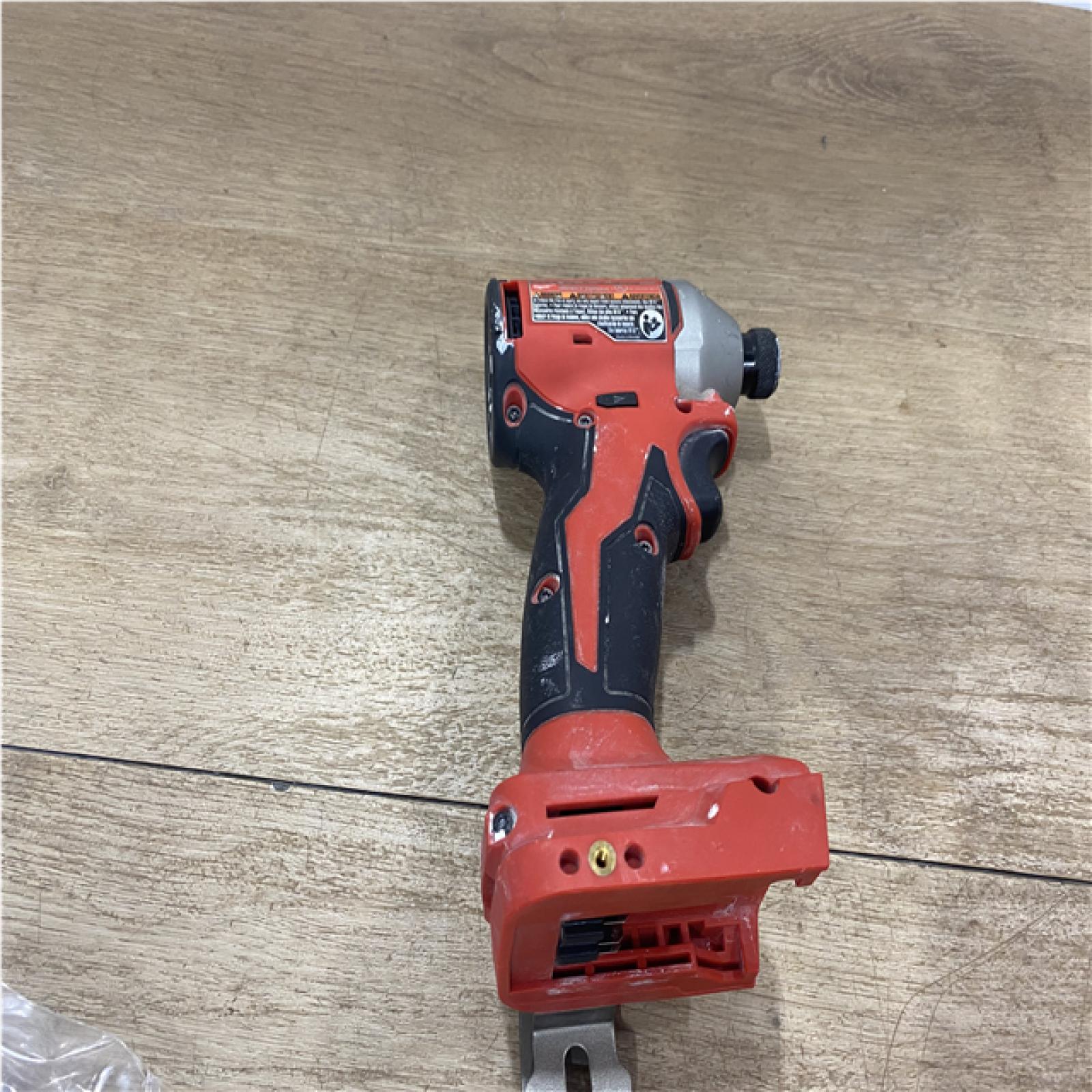 AS-IS Milwaukee 18V Lithium-Ion Compact Brushless Cordless 1/4 in. Impact Driver (Tool-Only)