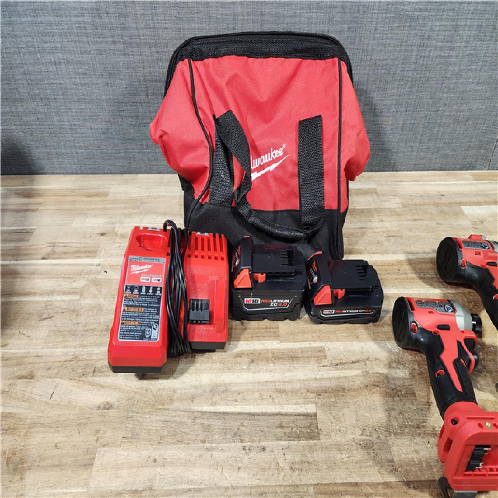 HOUSTON LOCATION - AS - IS Milwaukee 18-Volt Lithium-Ion Brushless Cordless Compact Hammer Drill/Impact Combo Kit