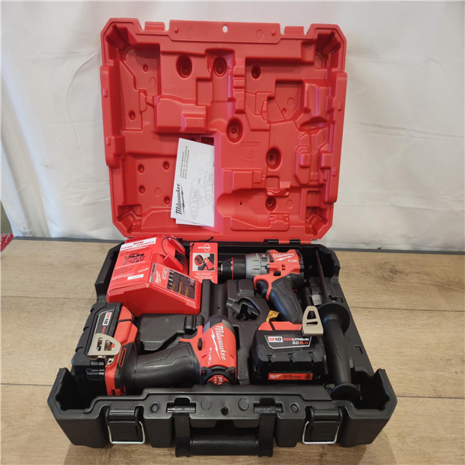 AS-IS- Milwaukee FUEL 18V Lithium-Ion Brushless Cordless Hammer Drill and Impact Driver Combo Kit