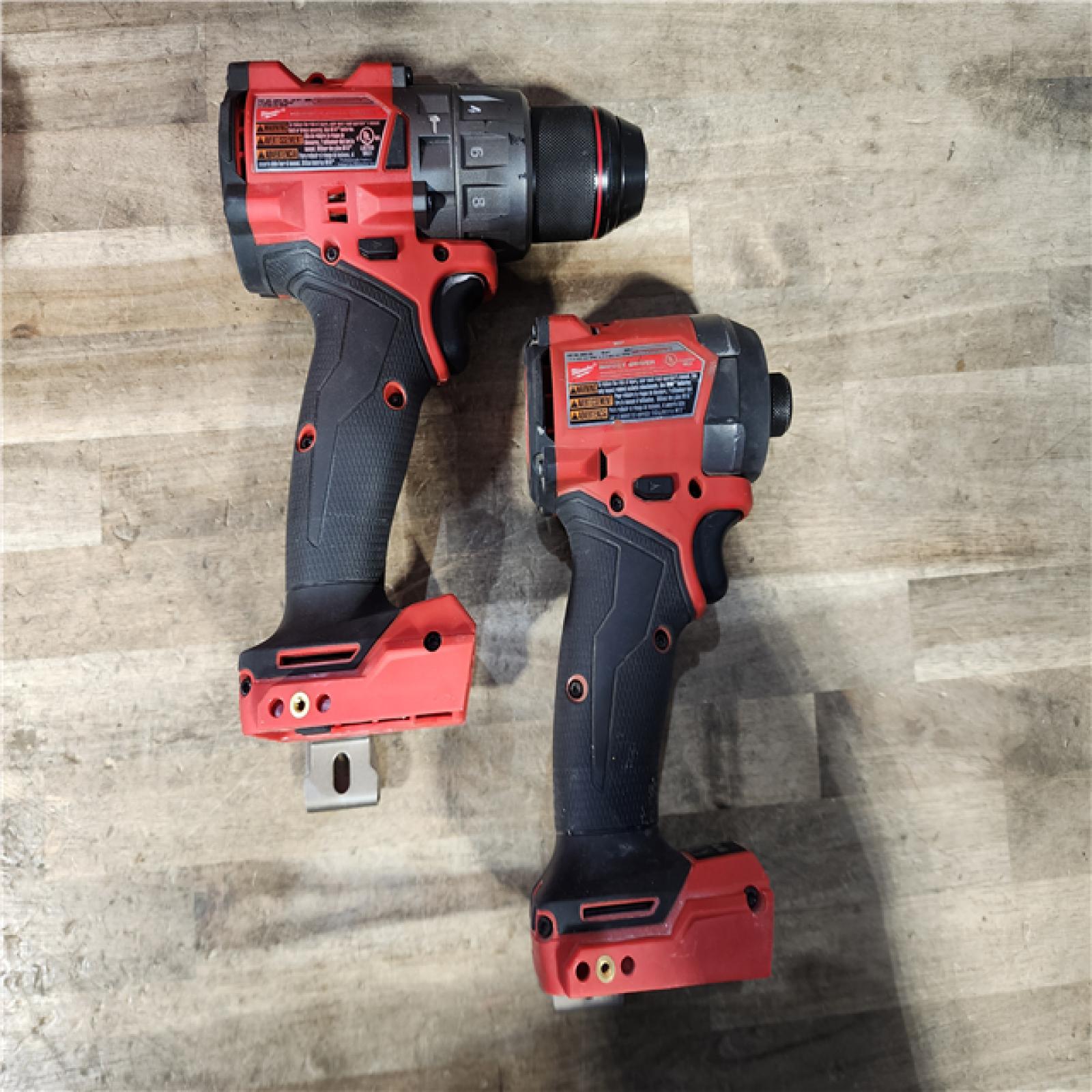 HOUSTON LOCATION - AS-IS Milwaukee FUEL 18V Lithium-Ion Brushless Cordless Hammer Drill and Impact Driver Combo Kit