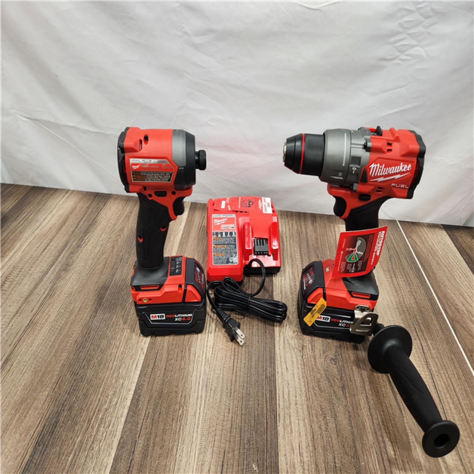 NEW! - Milwaukee M18 FUEL 18V Lithium-Ion Brushless Cordless Hammer Drill and Impact Driver Combo Kit (2-Tool) with 2 Batteries
