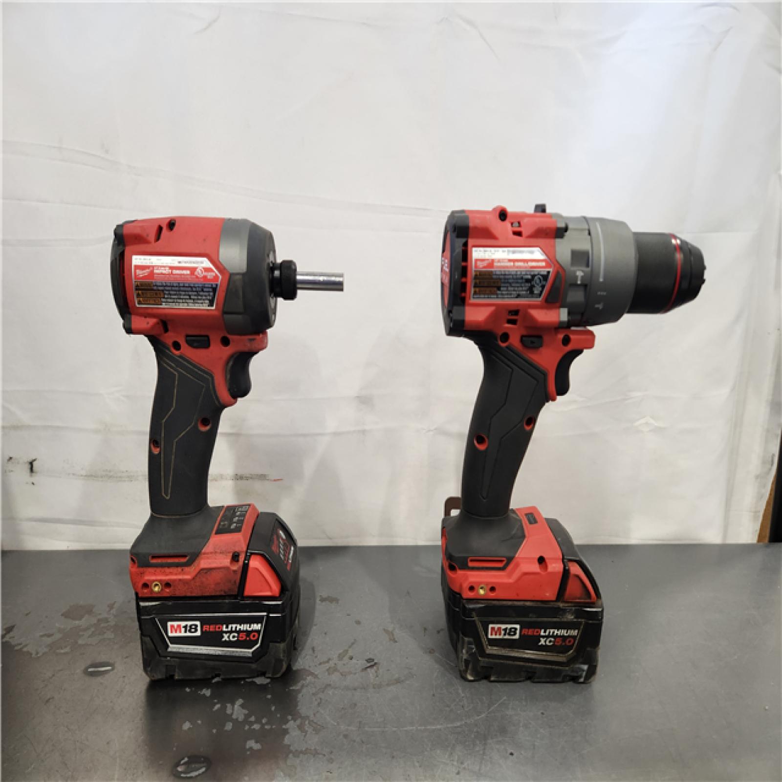 AS-IS- Milwaukee FUEL 18V Lithium-Ion Brushless Cordless Hammer Drill and Impact Driver Combo Kit