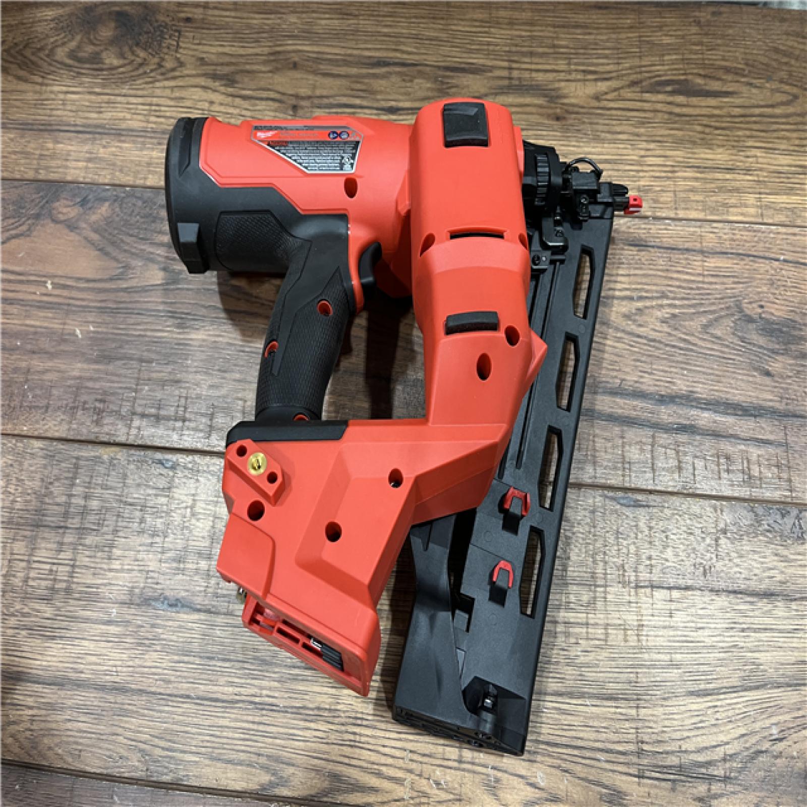 AS-IS Milwaukee M18 FUEL 18-Volt Lithium-Ion Brushless Cordless Gen II 16-Gauge Angled Finish Nailer Kit with 2.0Ah Battery and Charger