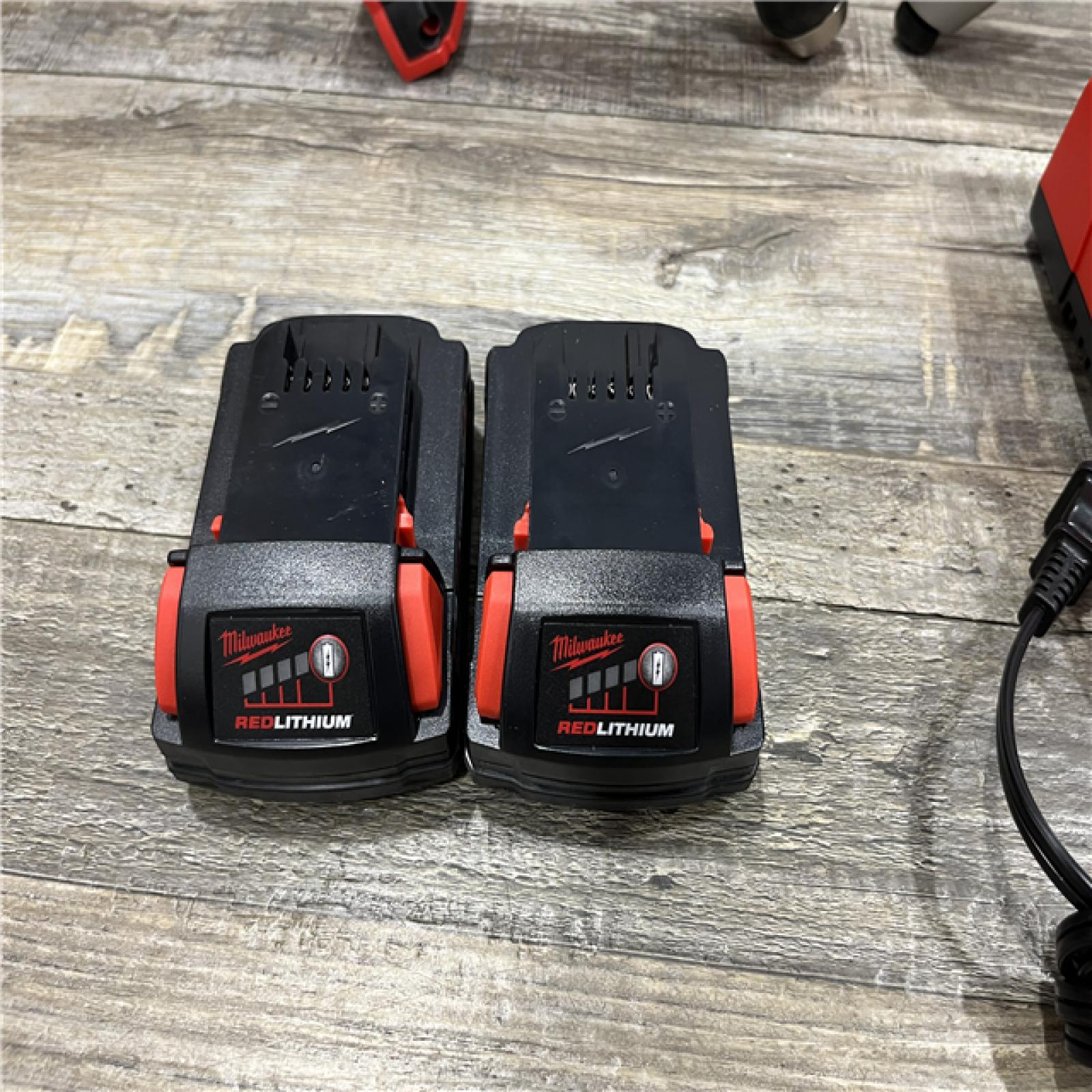AS-IS Milwaukee 18V Lithium-Ion Cordless Drill Driver/Impact Driver Combo Kit