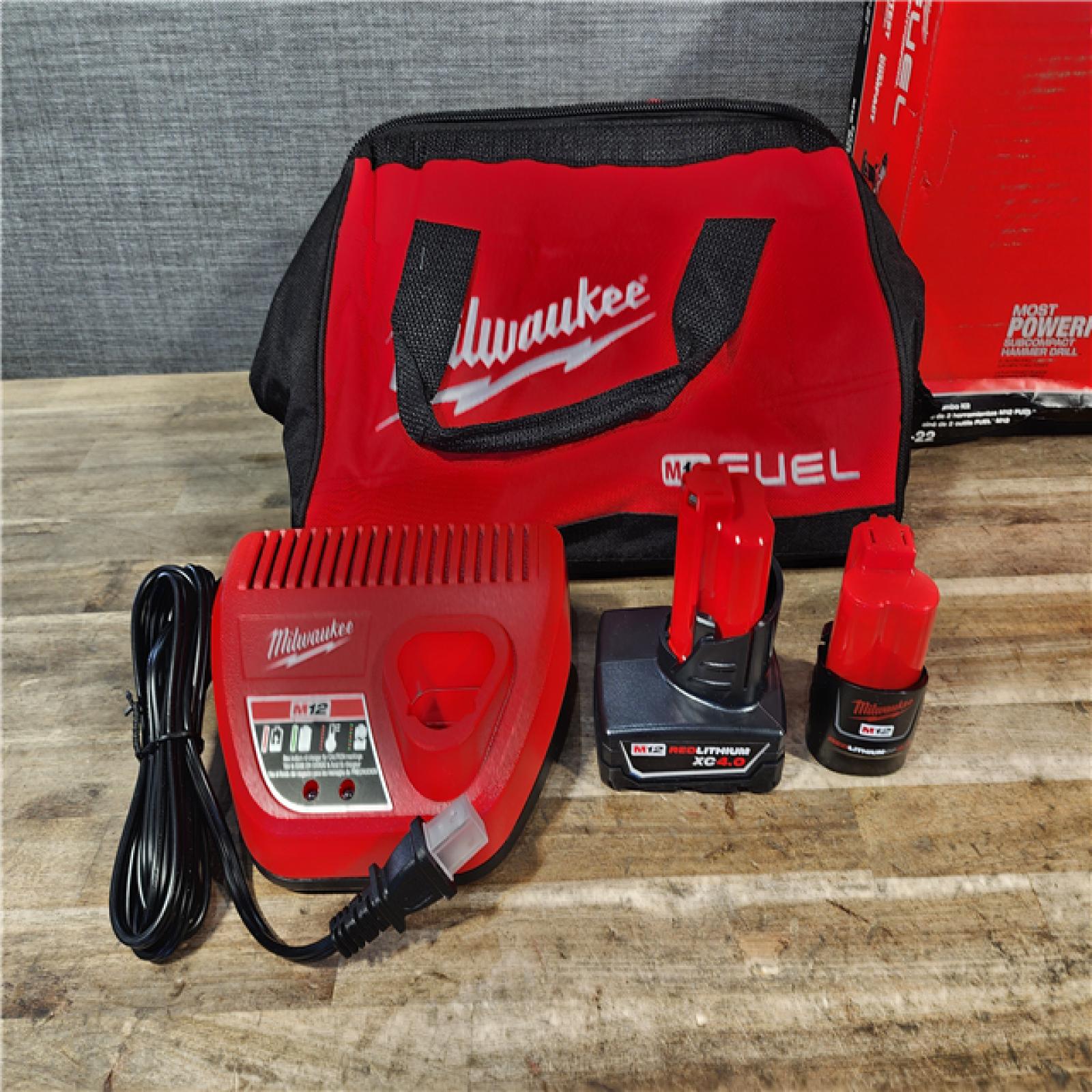 HOUSTON LOCATION - AS-IS Milwaukee FUEL 12-Volt Lithium-Ion Brushless Cordless Hammer Drill and Impact Driver Combo Kit