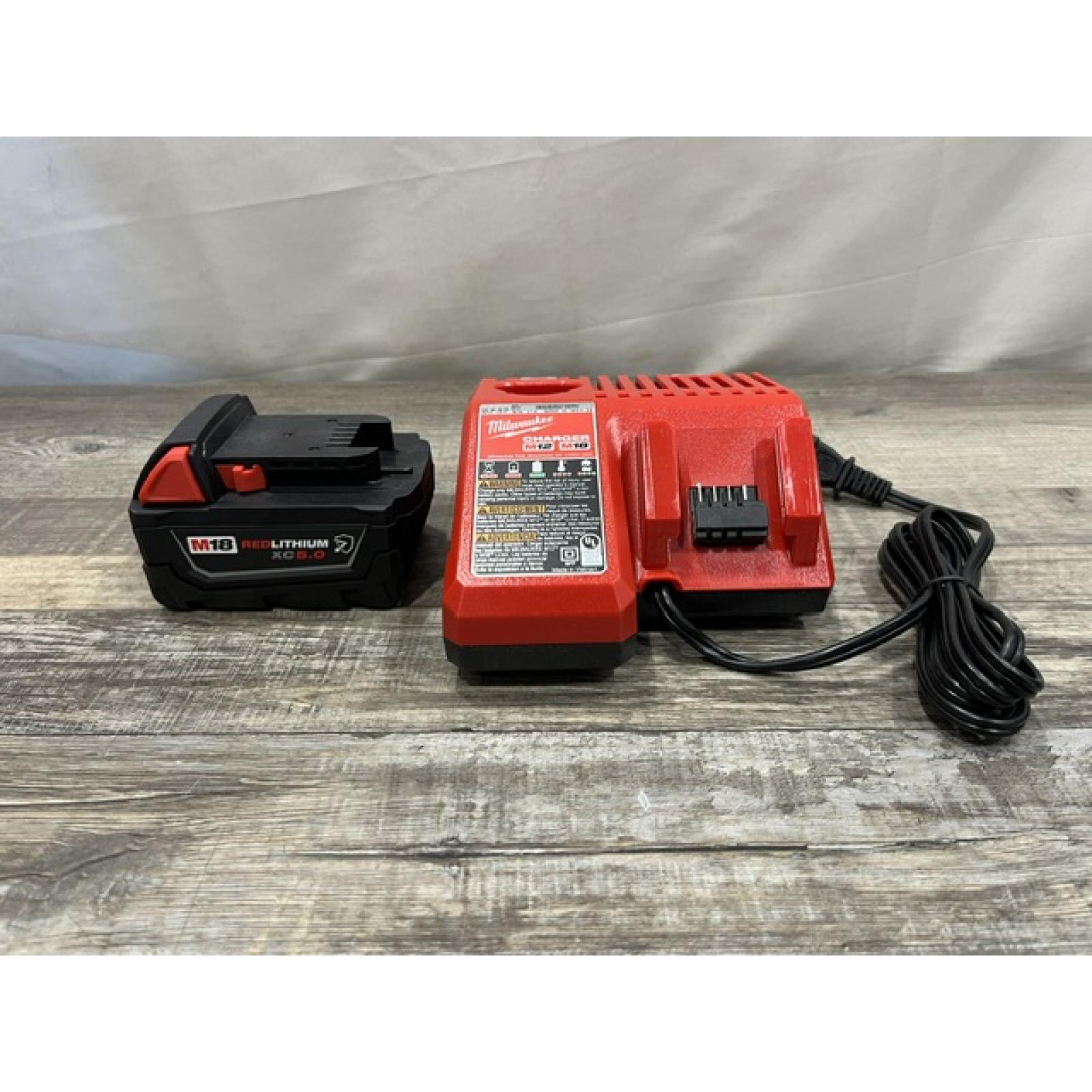 AS-IS Milwaukee 18-Volt Lithium-Ion XC Starter Kit with One 5.0Ah Battery and Charger