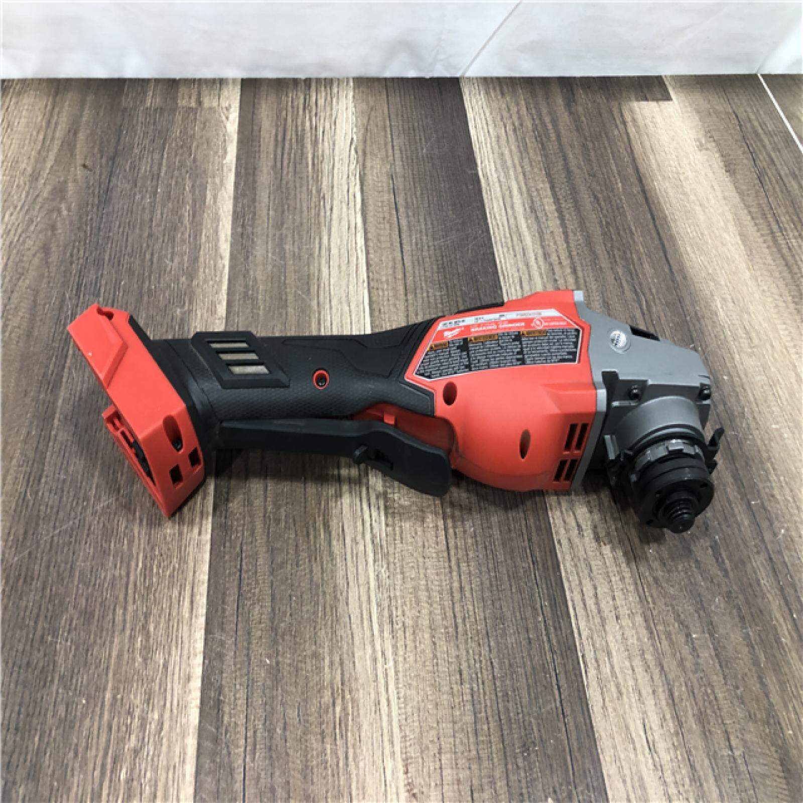 AS-IS Milwaukee FUEL 18-Volt Lithium-Ion Brushless Cordless 4-1/2 in./6 in. Braking Grinder with Paddle Switch (Tool-Only)