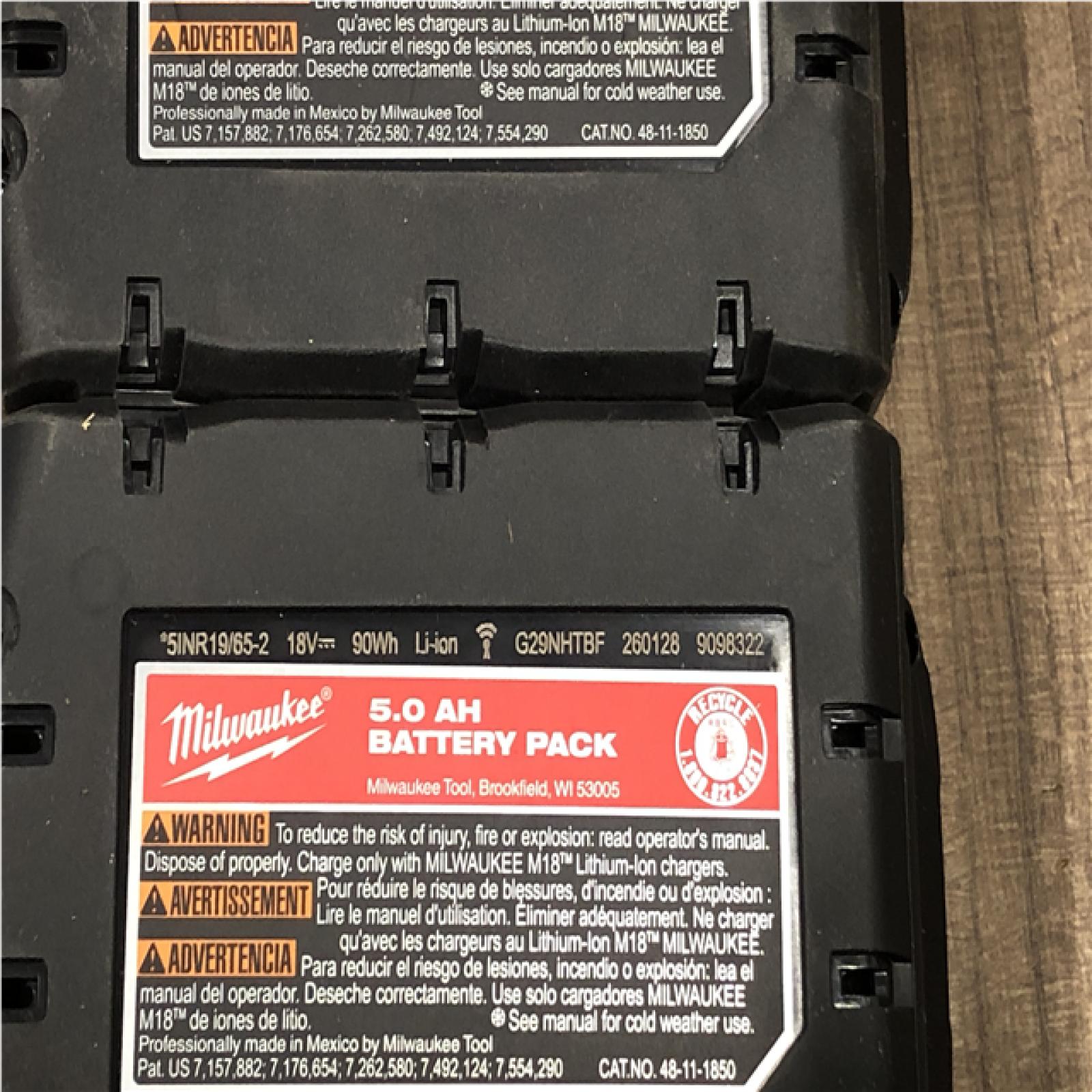 AS-IS Milwaukee 18-Volt Lithium-Ion XC Starter Kit with (2) 5.0Ah Batteries and Charger