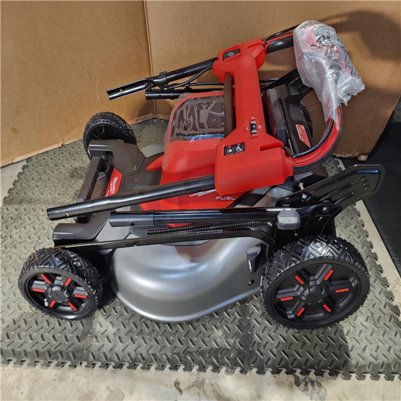HOUSTON LOCATION - AS-IS M18 FUEL Brushless Cordless 21 in. Walk Behind Dual Battery Self-Propelled Mower W/(2) 12.0Ah Battery and Rapid Charger