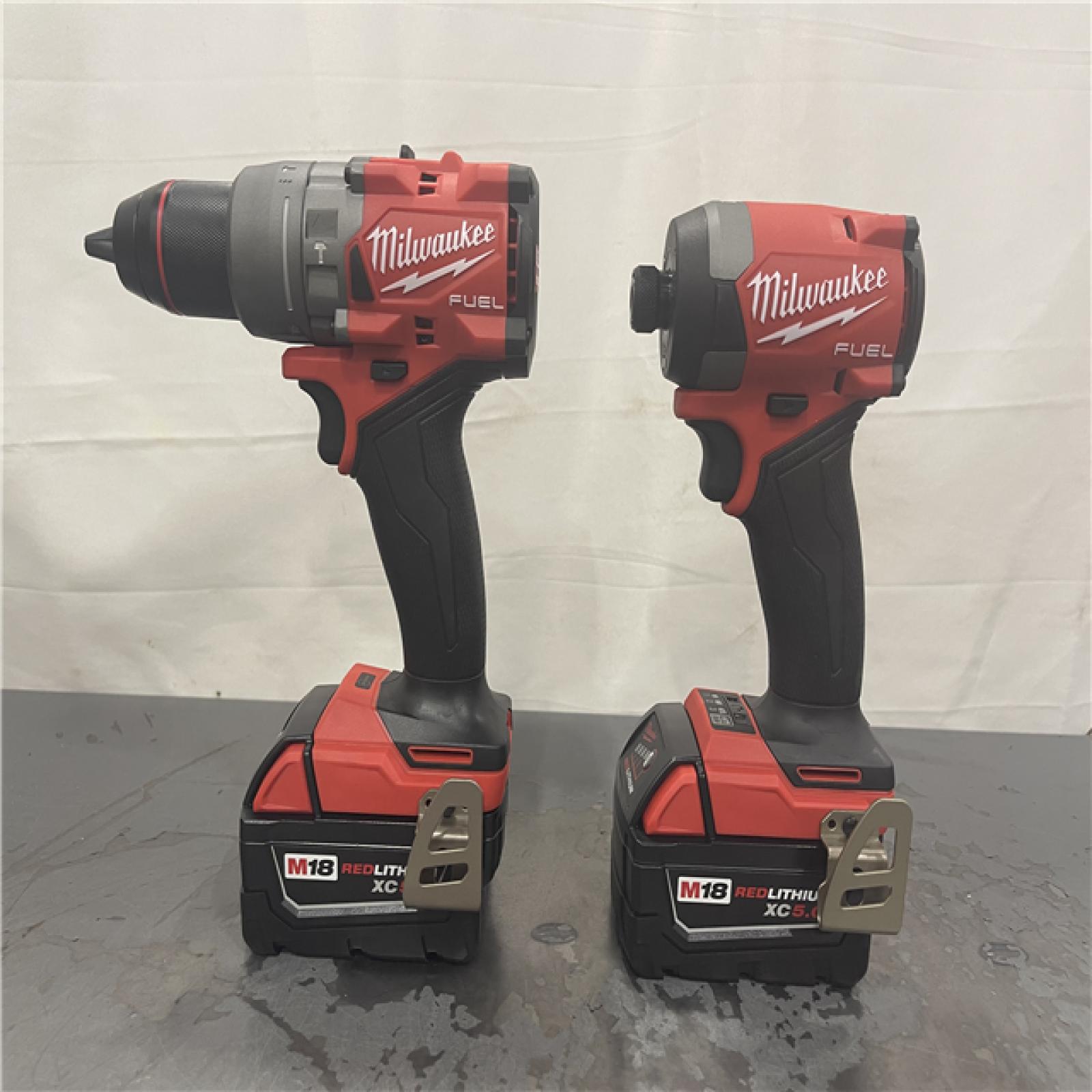 AS-IS- MILWAUKEE FUEL 18V Lithium-Ion Brushless Cordless Hammer Drill and Impact Driver Combo Kit