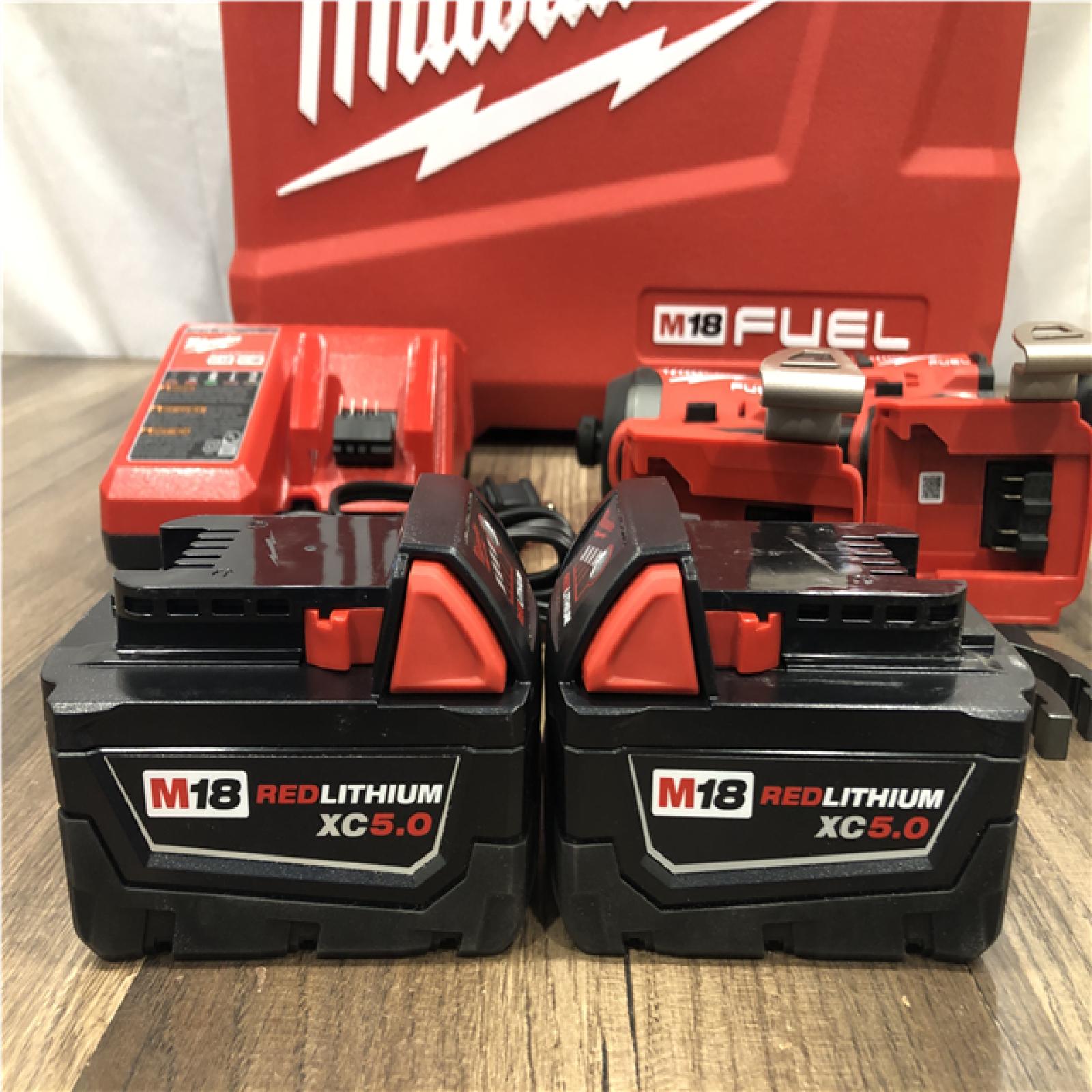 AS-IS Milwaukee FUEL 18V Lithium-Ion Brushless Cordless Hammer Drill and Impact Driver Combo Kit