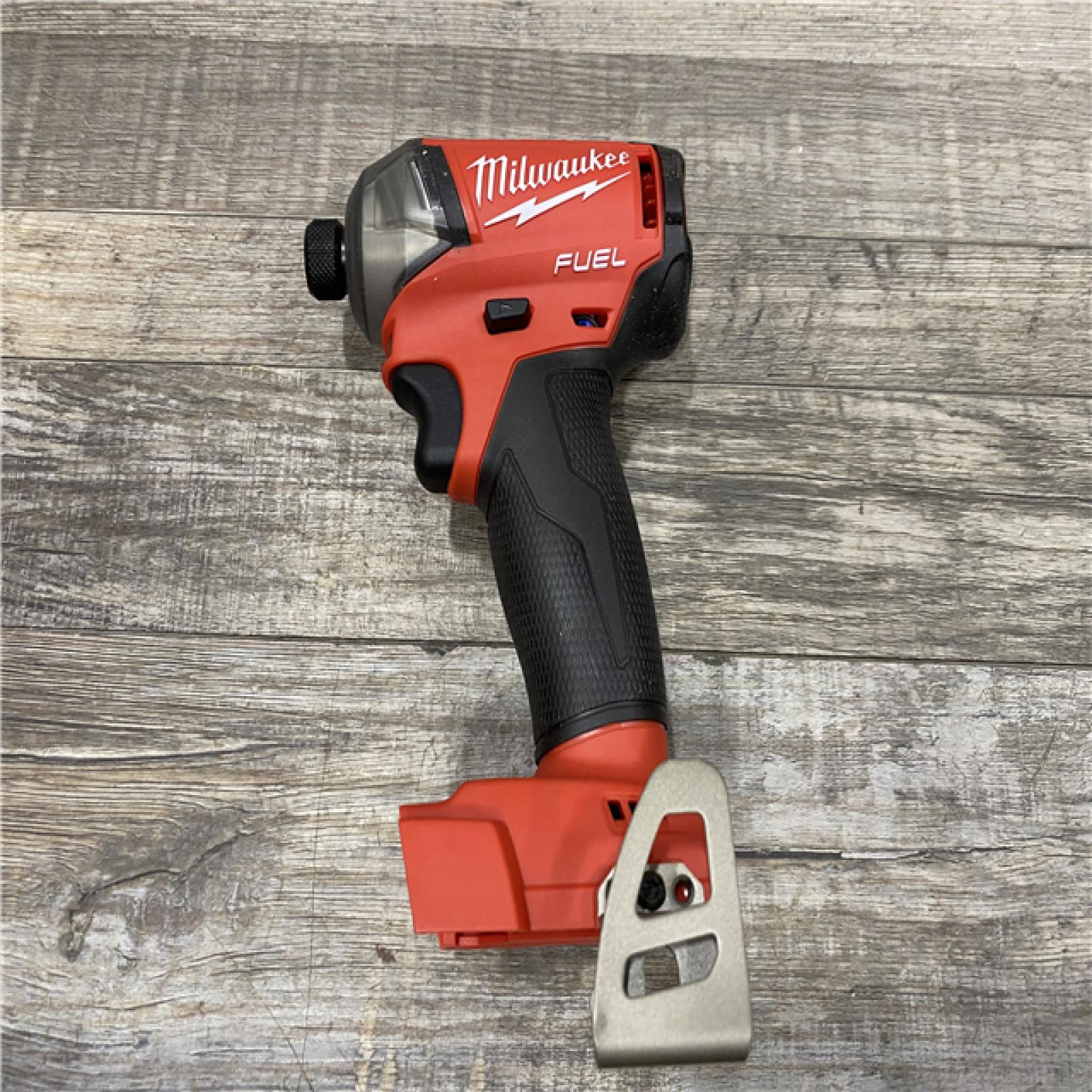 AS-IS Milwaukee FUEL SURGE 18V Lithium-Ion Brushless Cordless 1/4 in. Hex Impact Driver (Tool-Only)
