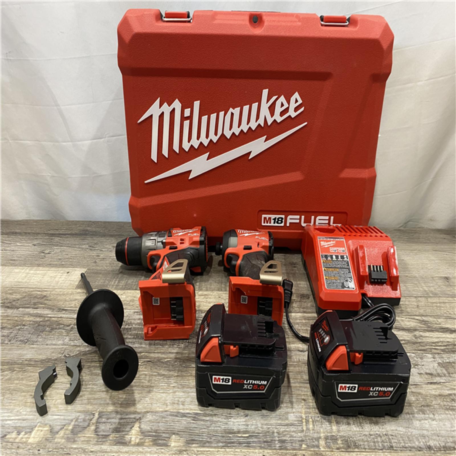 AS-IS Milwaukee FUEL 18V Lithium-Ion Brushless Cordless Hammer Drill and Impact Driver Combo Kit
