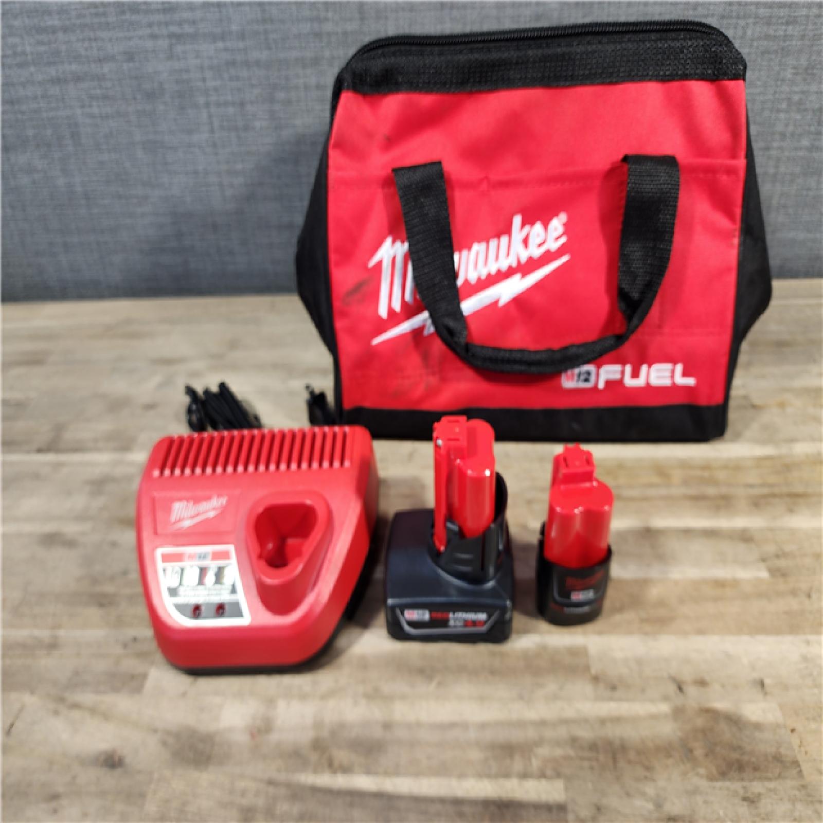 HOUSTON LOCATION - AS-IS Milwaukee 3497-22 12V Brushless Hammer Drill and Impact Driver Combo Kit