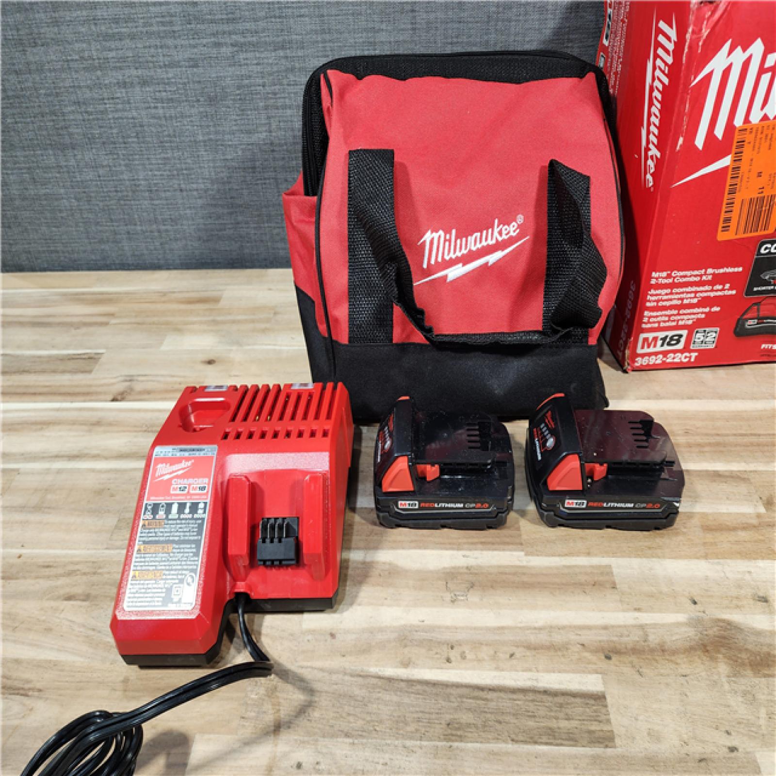HOUSTON LOCATION - AS-IS Milwaukee 18V Lithium-Ion Brushless Cordless Compact Drill/Impact Combo Kit