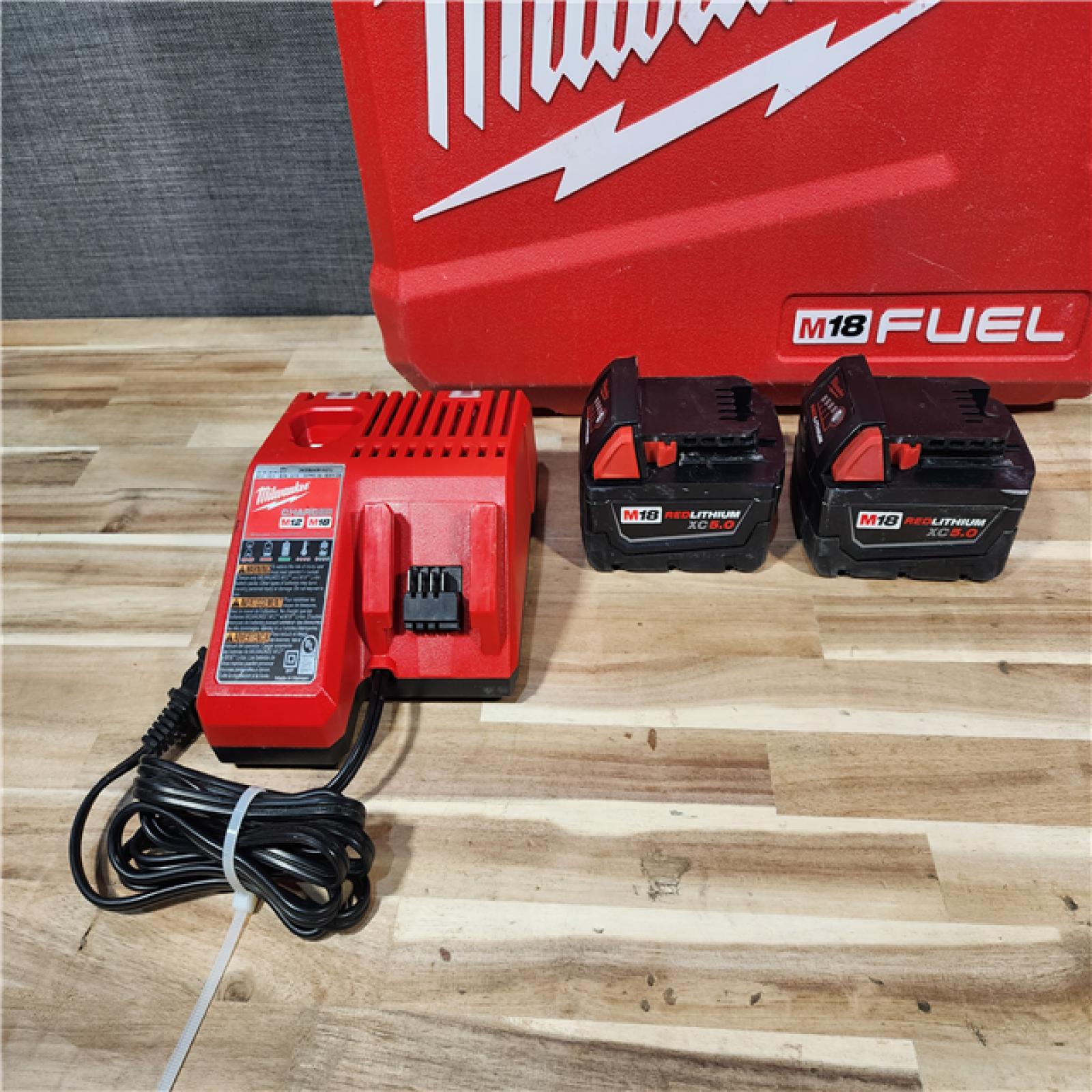 HOUSTON LOCATION - AS-IS Milwaukee FUEL 18V Lithium-Ion Brushless Cordless Hammer Drill and Impact Driver Combo Kit