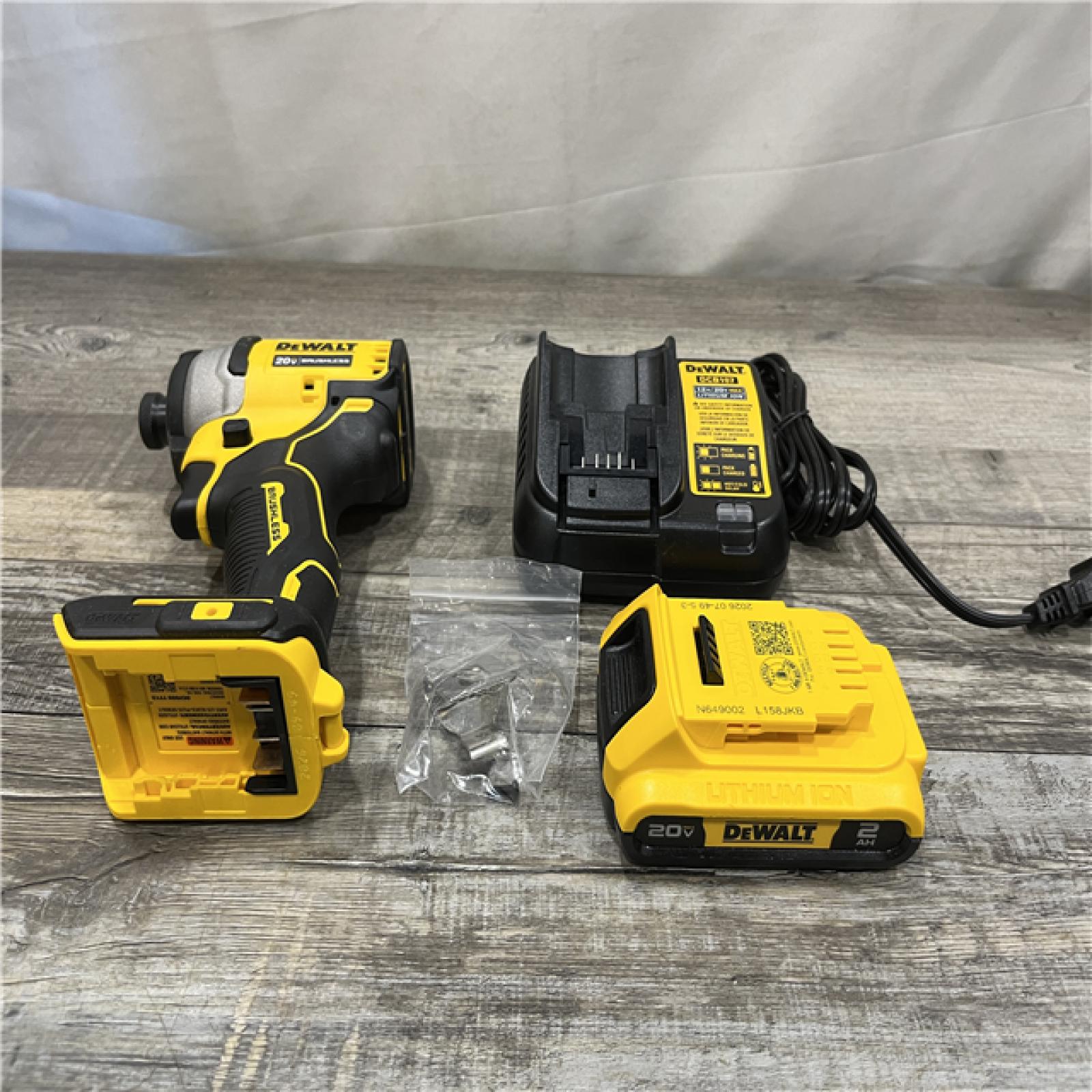 AS-IS DEWALT Atomic 20V Max Lithium-Ion Brushless Cordless Compact 1/4 in. Impact Driver Kit