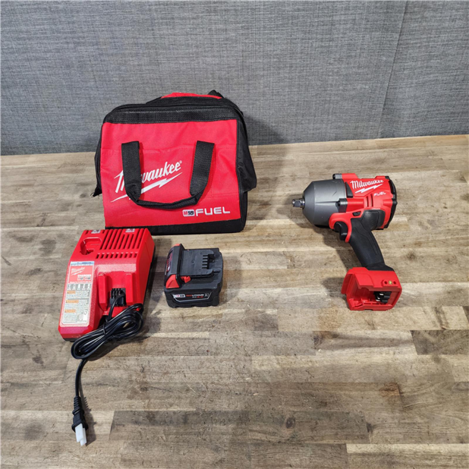 Milwaukee M18 FUEL 18-Volt Lithium-Ion Brushless Cordless 1/2 in. Impact Wrench with Friction Ring W/ BATTERY & CHARGER