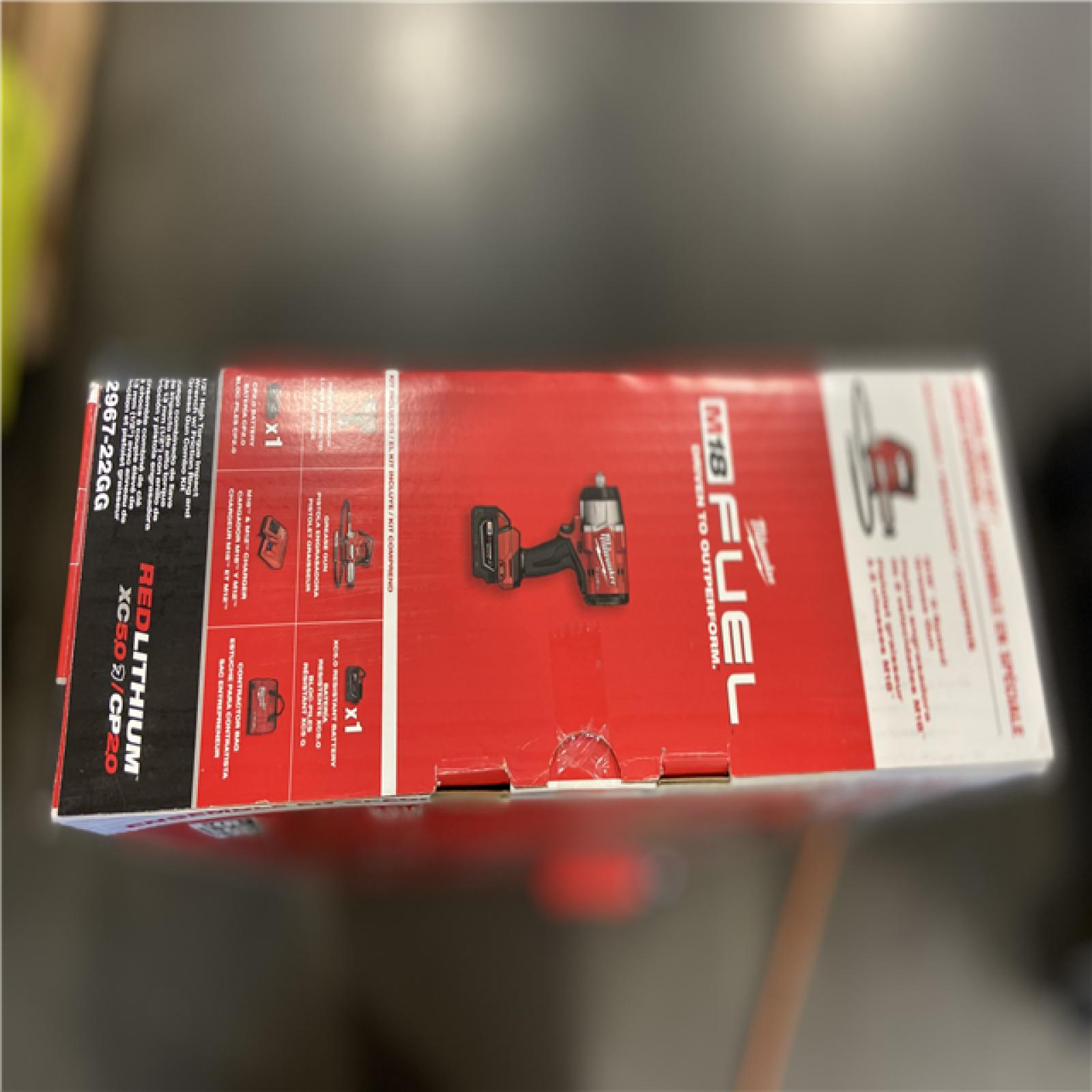 AS-IS Milwaukee M18 FUEL 18V Lithium-Ion Brushless Cordless High Torque 1/2 in. Impact Wrench w/ Friction Ring & Grease Gun Combo Kit