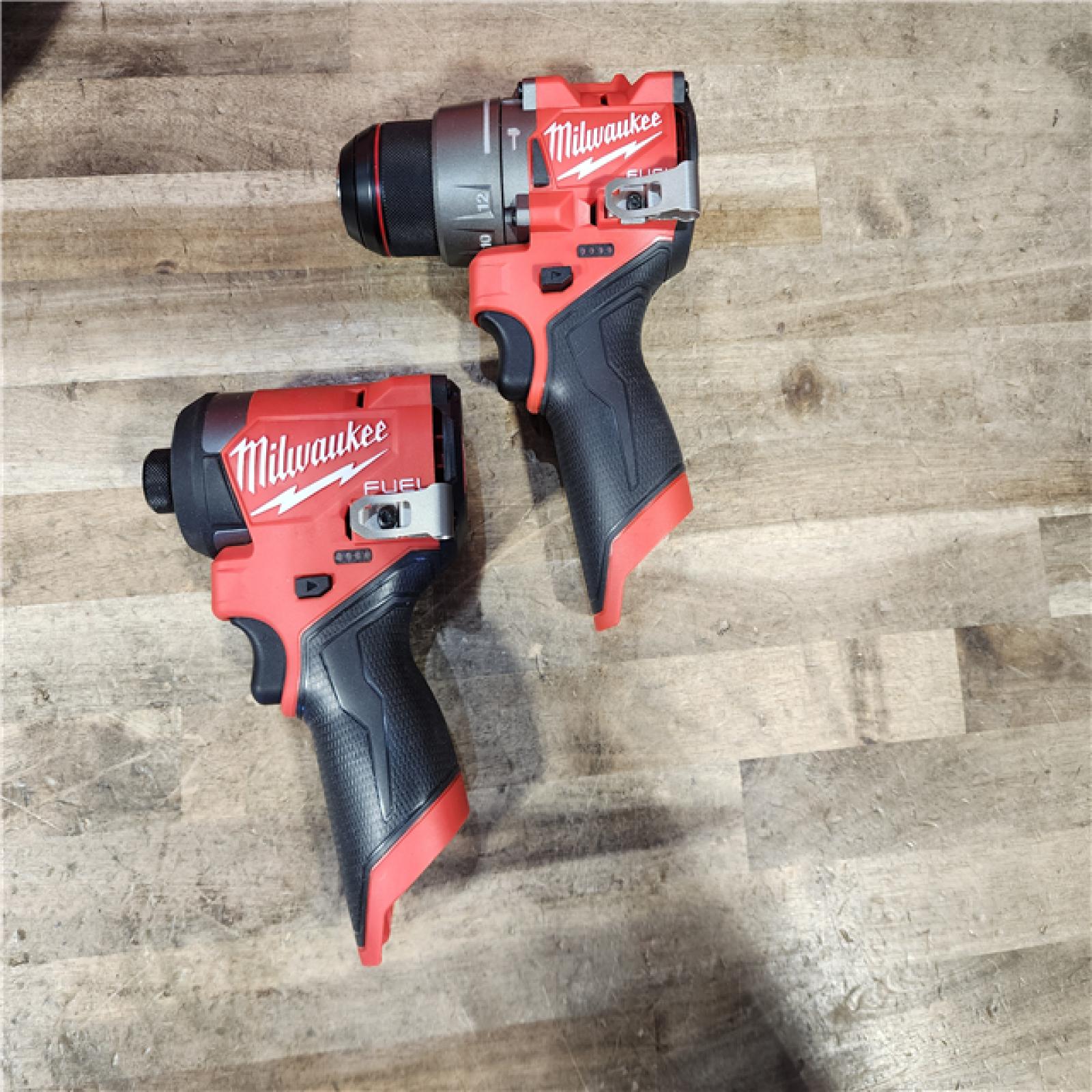 HOUSTON LOCATION - AS-IS Milwaukee FUEL 12-Volt Lithium-Ion Brushless Cordless Hammer Drill and Impact Driver Combo Kit