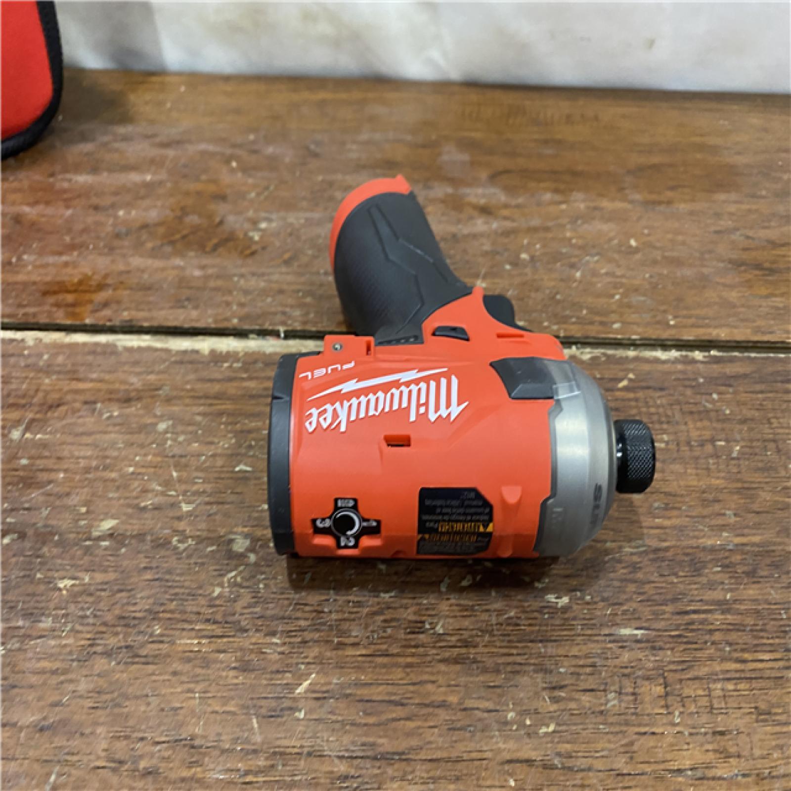 AS-IS M12 FUEL SURGE 12V Lithium-Ion Brushless Cordless 1/4 in. Hex Impact Driver Compact Kit W/Two 2.0Ah Batteries, Bag