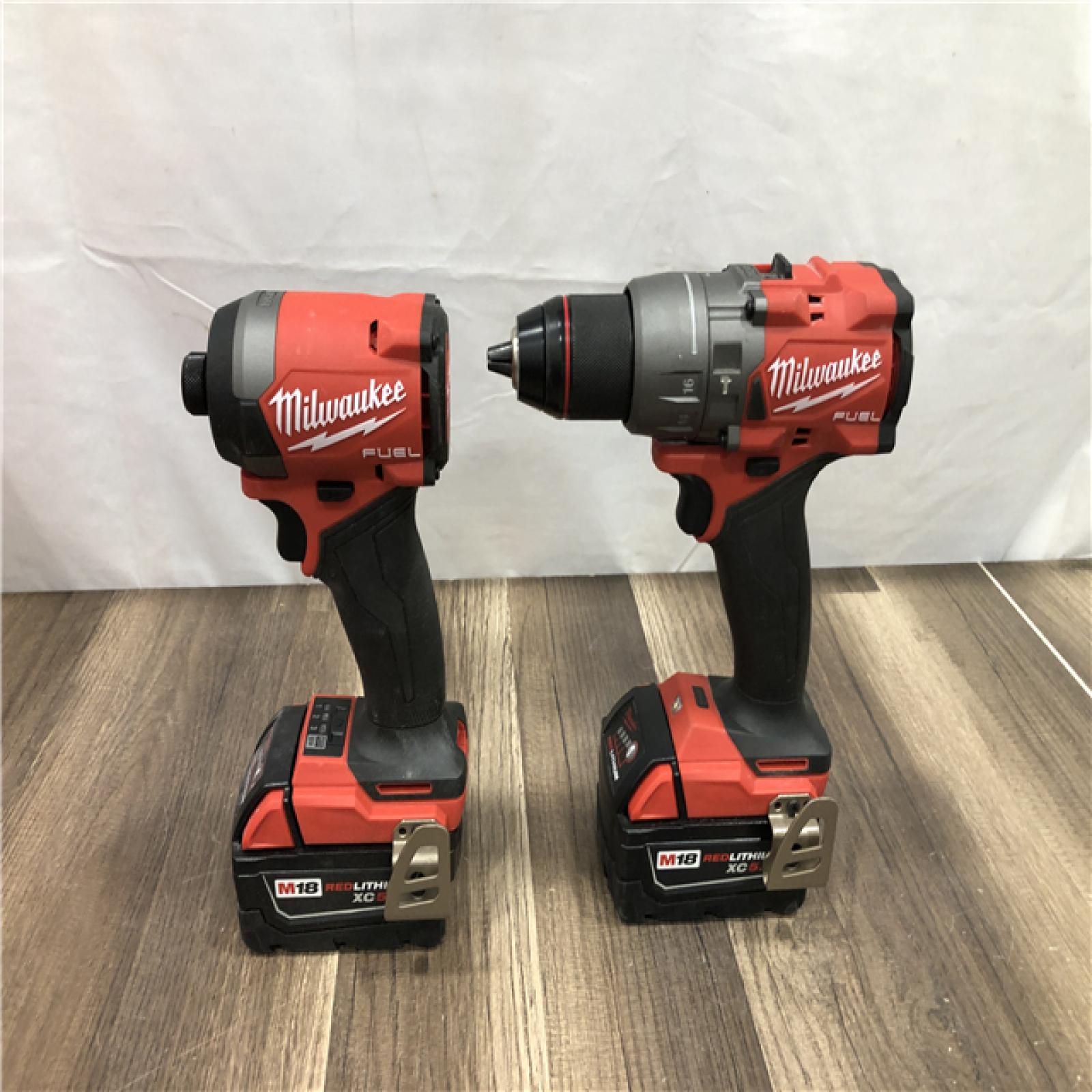AS-IS Milwaukee FUEL 18V Lithium-Ion Brushless Cordless Hammer Drill and Impact Driver Combo Kit
