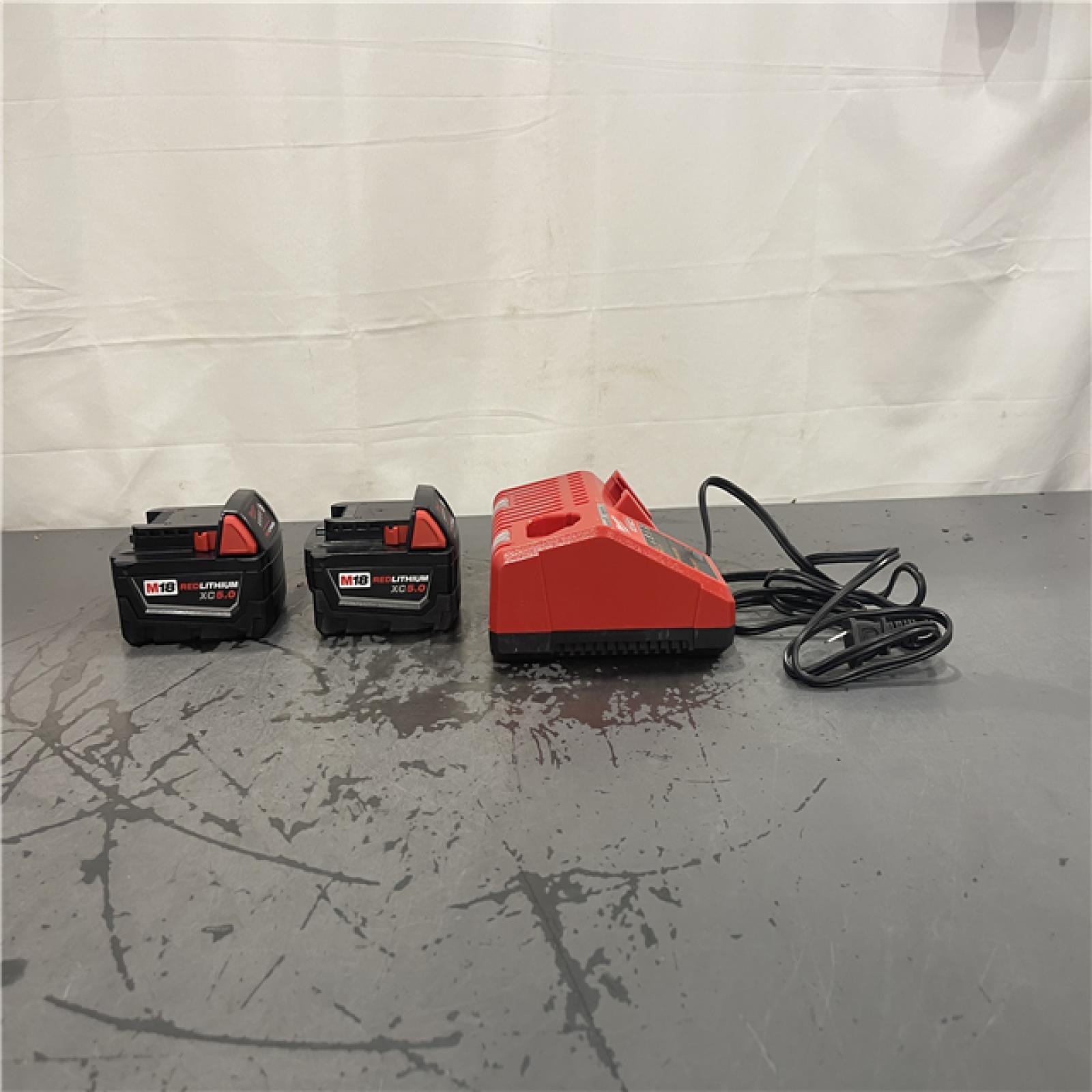 AS-IS- M18 18-Volt Lithium-Ion XC Starter Kit with Two 5.0Ah Batteries and Charger