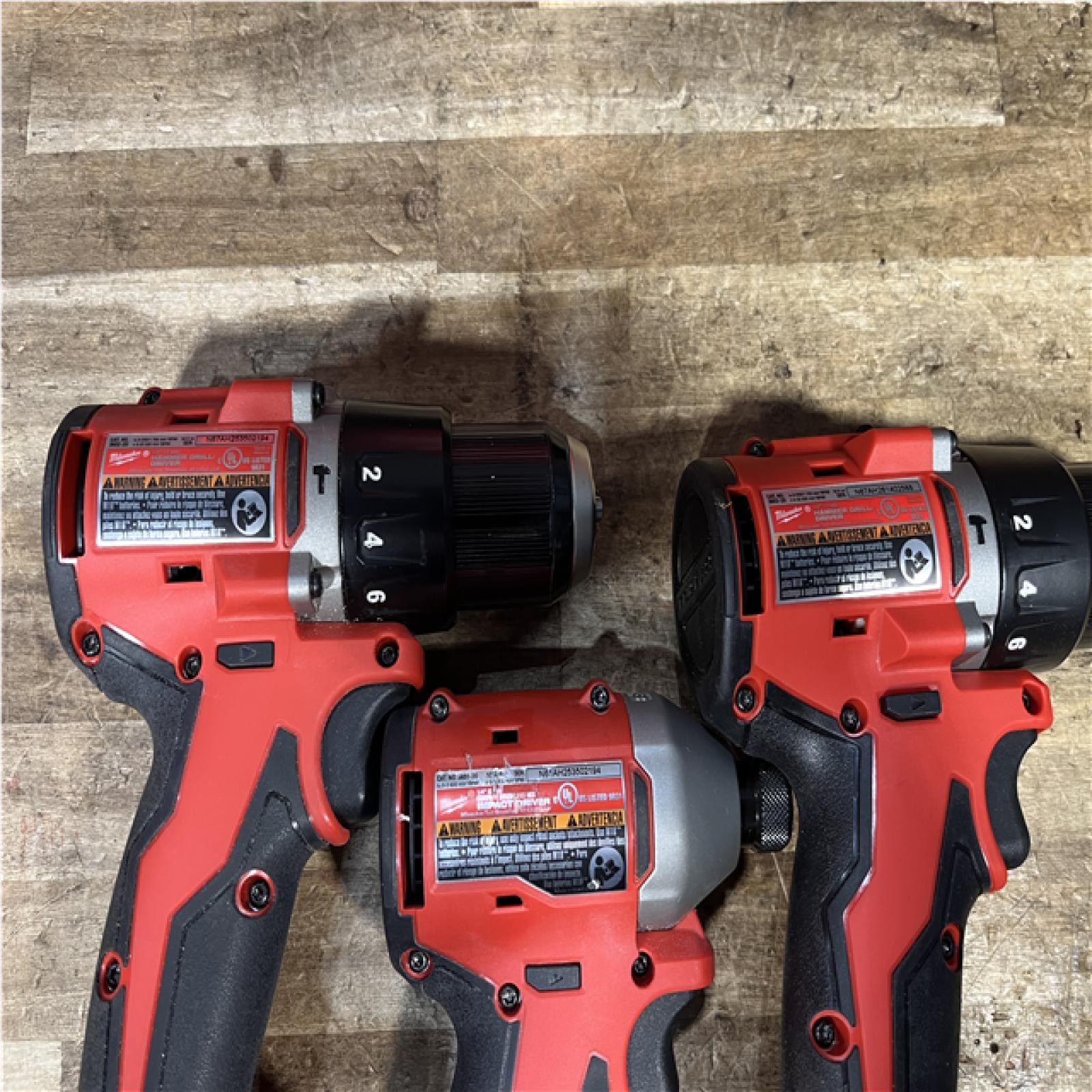 Houston Location AS-IS Milwaukee Drill Drivers and Impact Driver and Batteries QTY/2 with Charger
