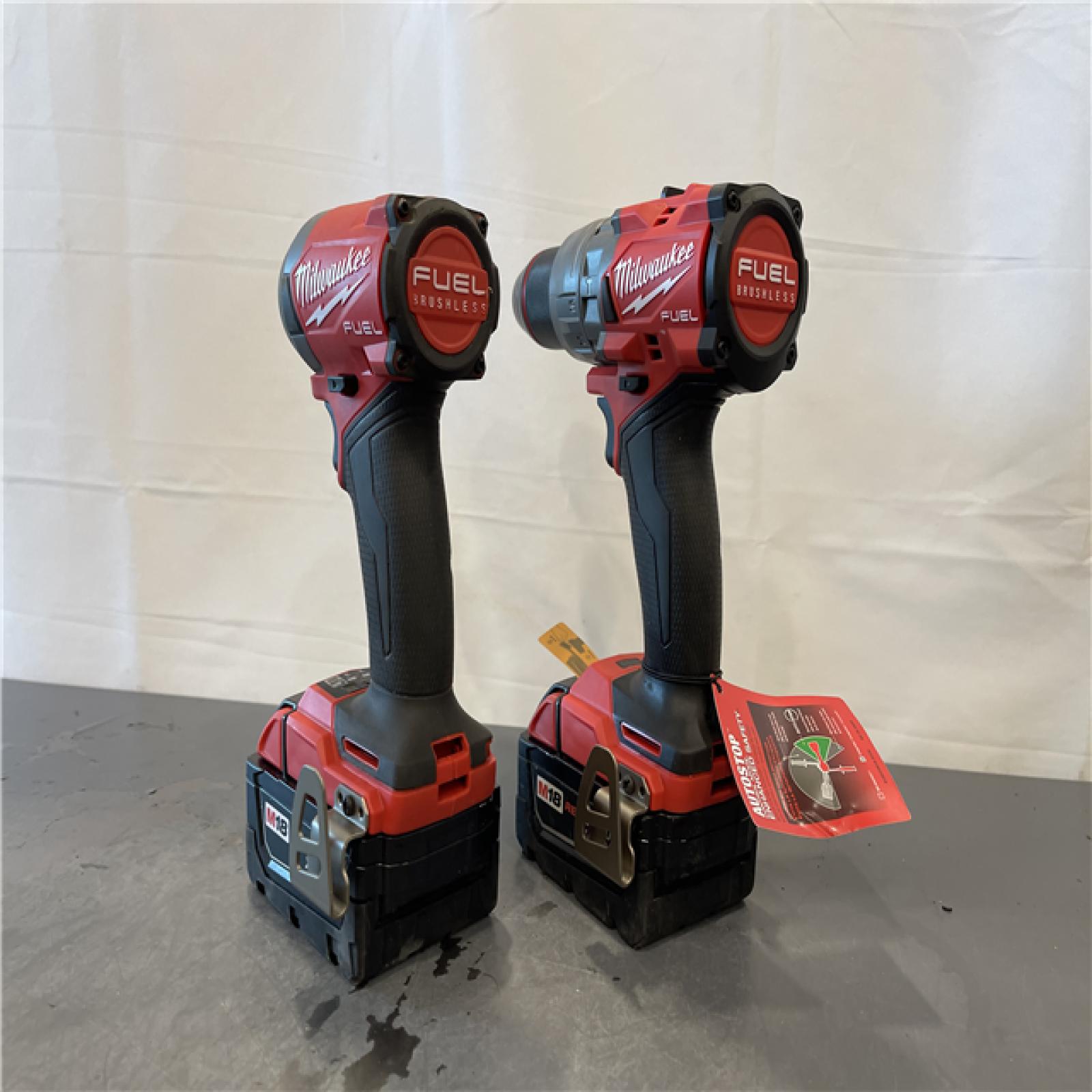 AS-IS - MILWAUKEE FUEL 18V Lithium-Ion Brushless Cordless Hammer Drill and Impact Driver Combo Kit