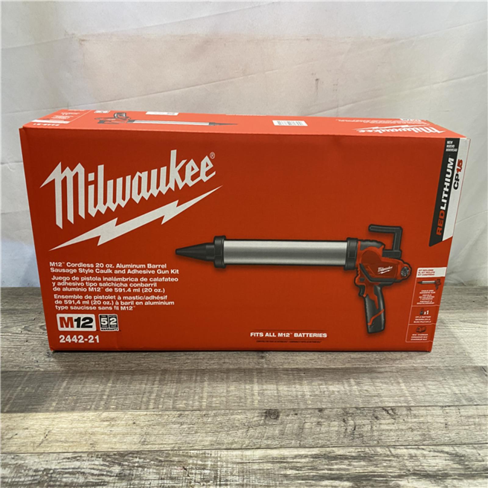 NEW - Milwaukee 12V Lithium-ion Cordless 20 oz. Aluminum Barrel Adhesive and Caulk Gun Kit