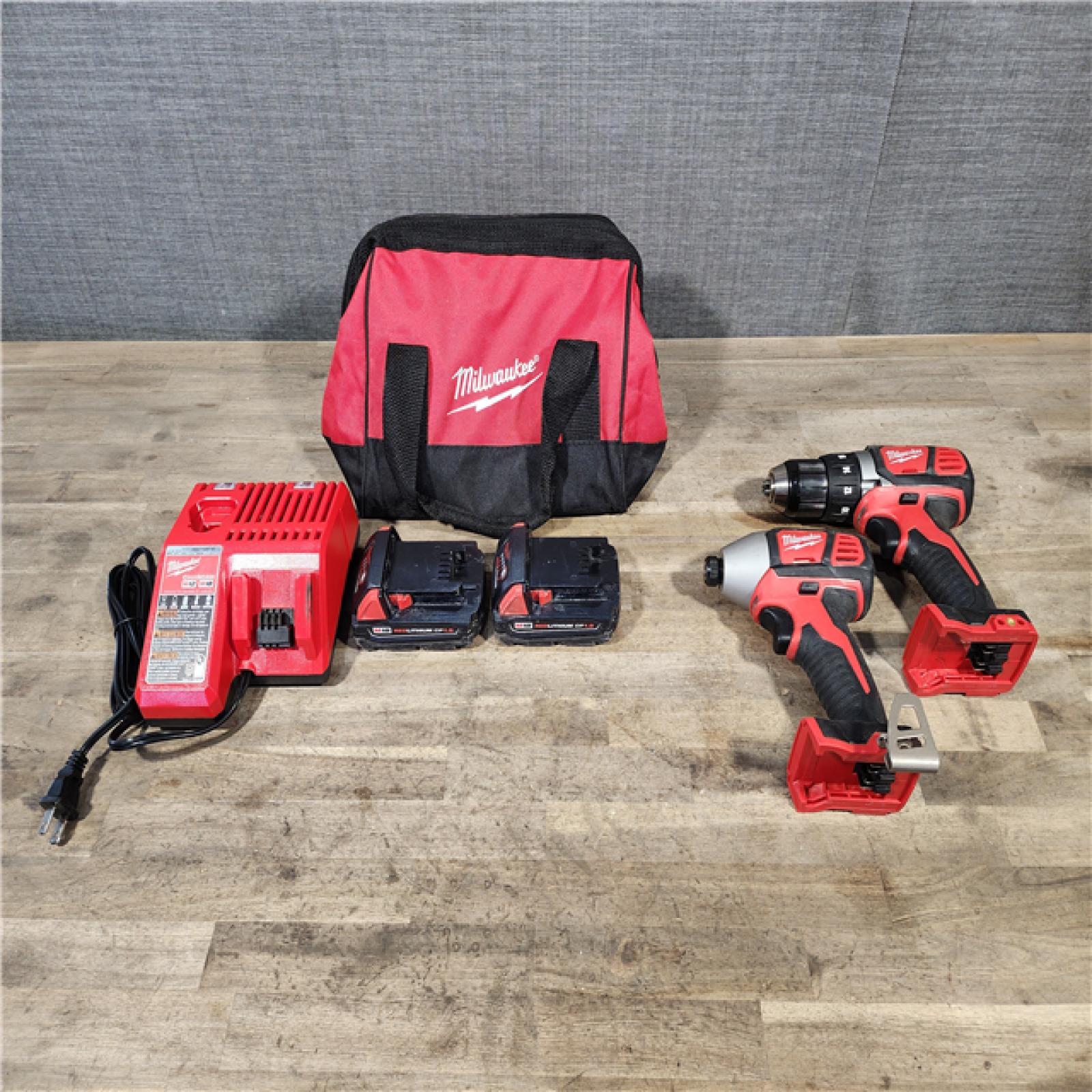 HOUSTON LOCATION - AS-IS Milwaukee 18V Cordless Brushed 2-Tool Drill/Driver and Impact Driver Kit