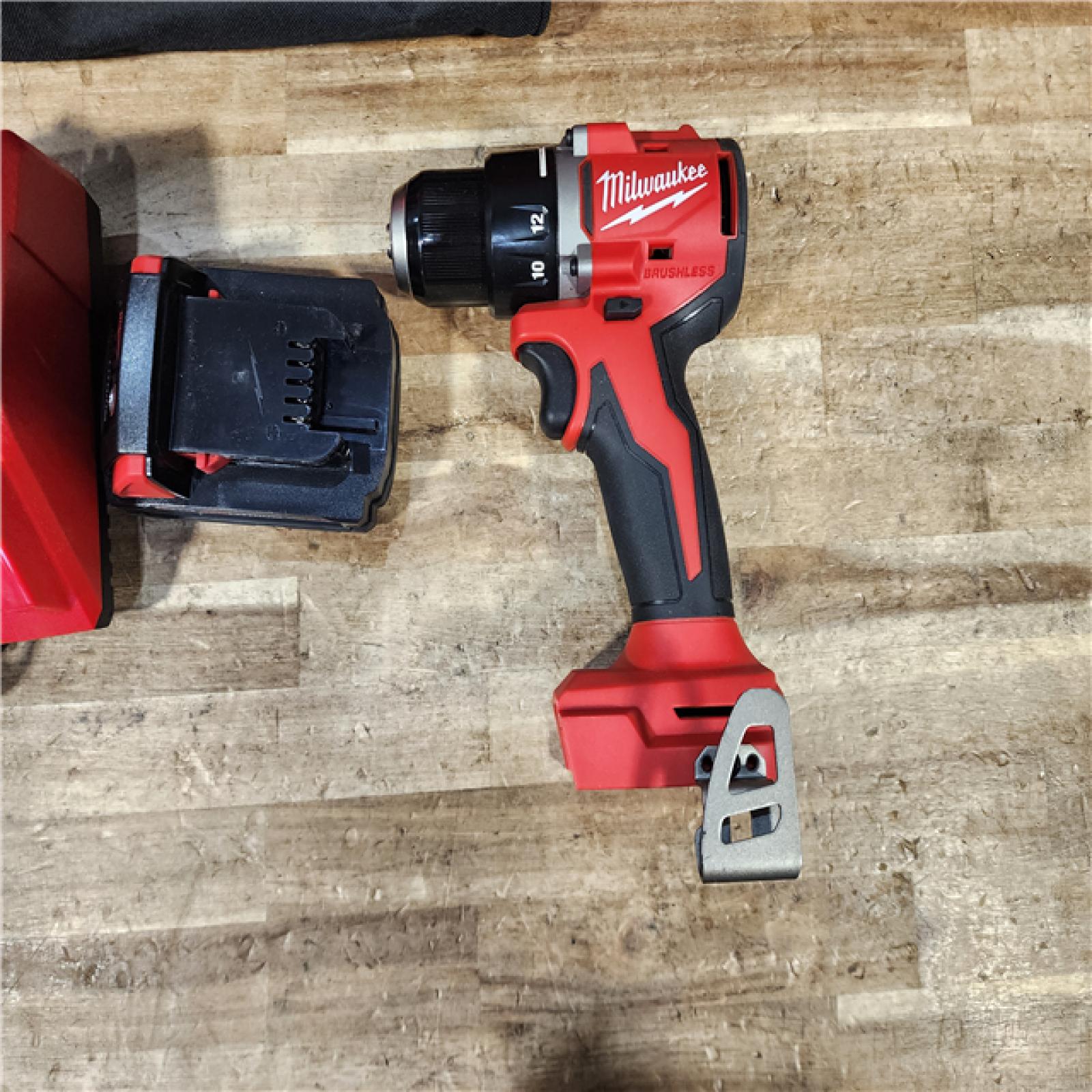 HOUSTON LOCATION - AS - IS Milwaukee 18V Lithium-Ion Brushless Cordless 1/2 in. Compact Drill/Driver with kit