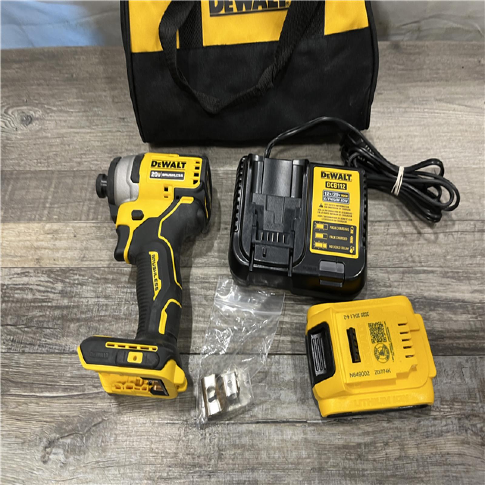 AS-IS DEWALT Atomic 20V Max Lithium-Ion Brushless Cordless Compact 1/4 in. Impact Driver Kit
