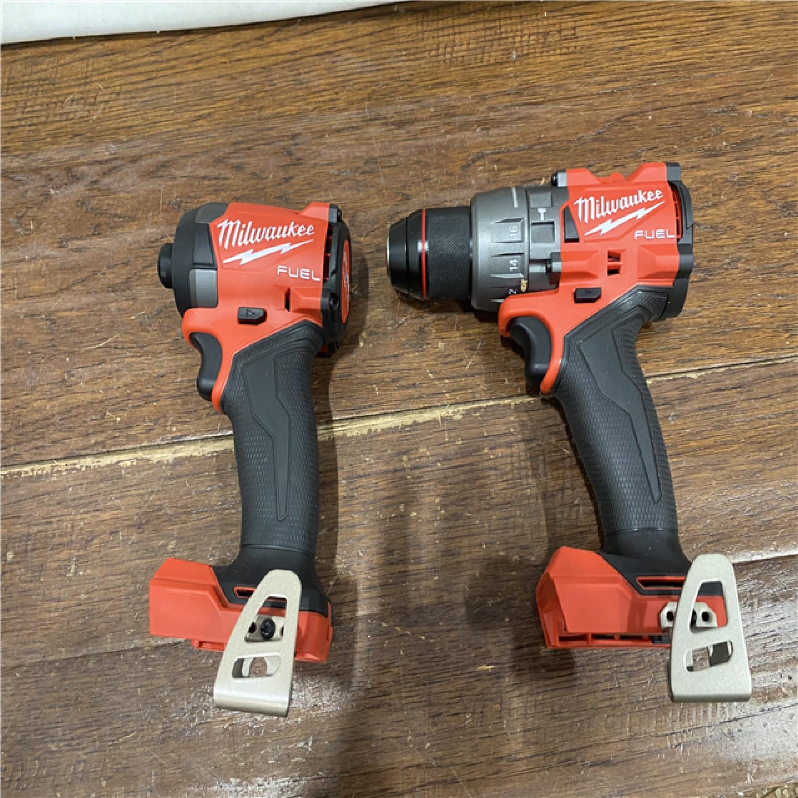 AS-IS MILWAUKEE M18 FUEL 18V Lithium-Ion Brushless Cordless Hammer Drill and Impact Driver Combo Kit (2-Tool) with 2 Batteries