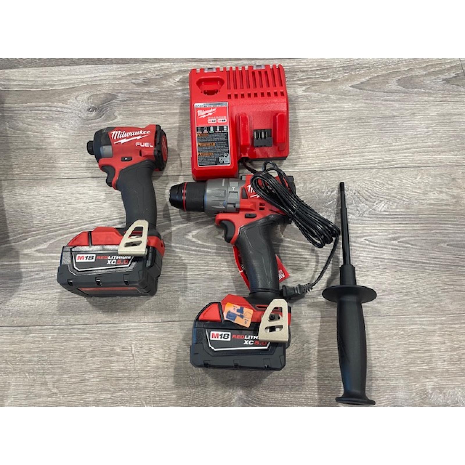 AS-IS Milwaukee FUEL 18V Lithium-Ion Brushless Cordless Hammer Drill and Impact Driver Combo Kit