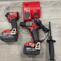AS-IS Milwaukee FUEL 18V Lithium-Ion Brushless Cordless Hammer Drill and Impact Driver Combo Kit