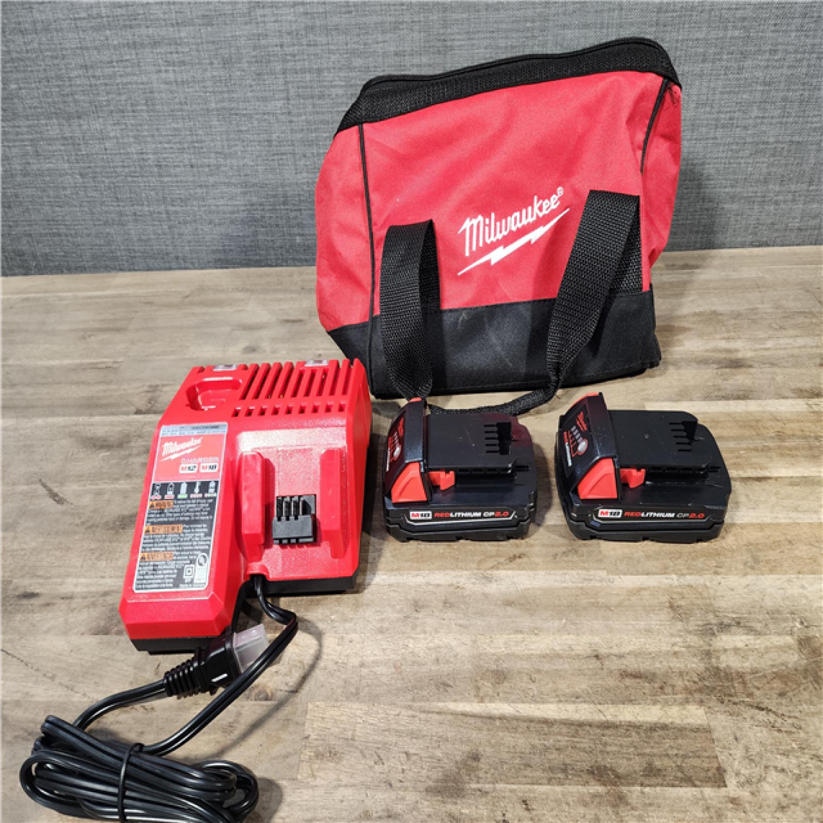 HOUSTON LOCATION - AS-IS Milwaukee 18V Cordless Brushed 2-Tool Drill/Driver and Impact Driver Kit
