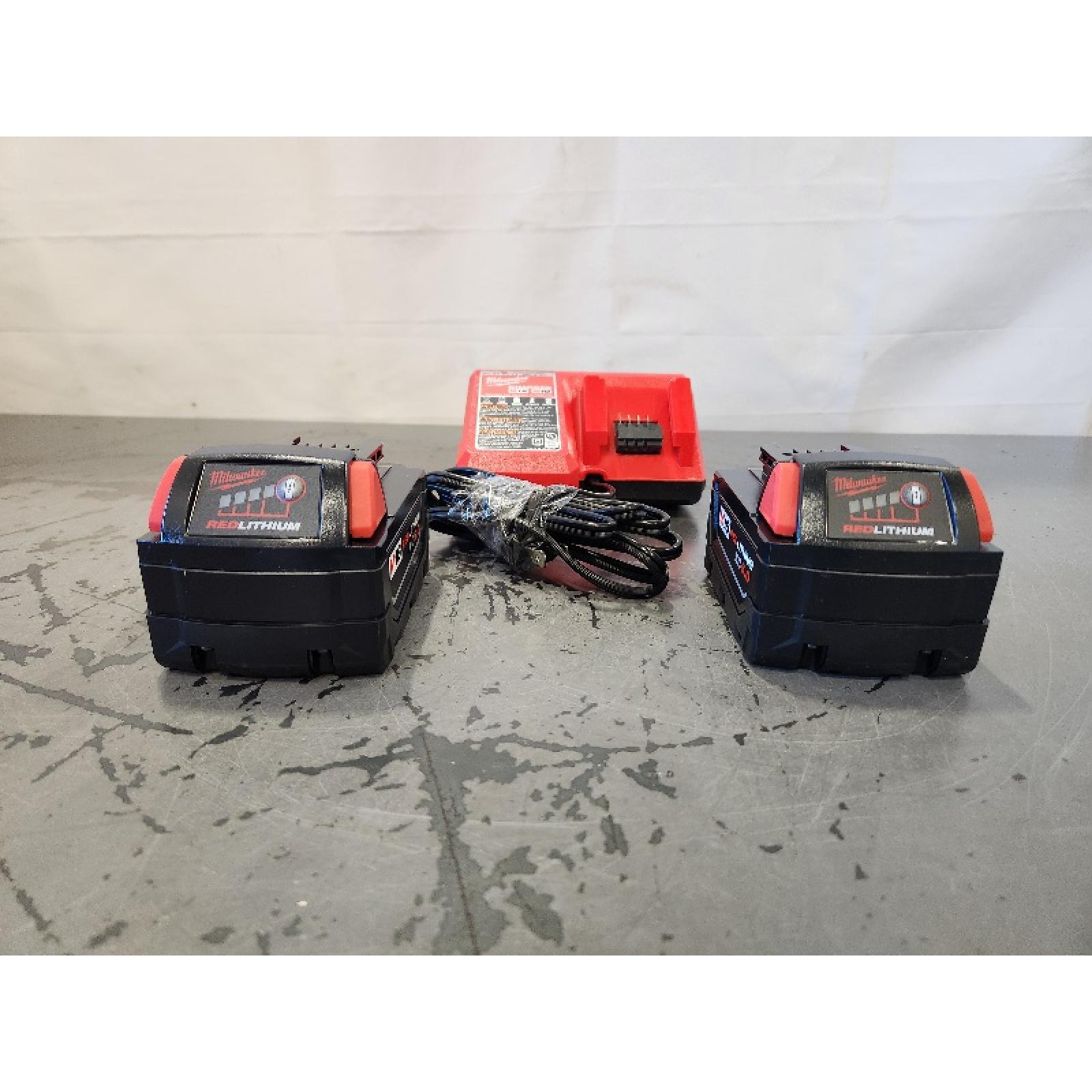 AS-IS- Milwaukee M18 18-Volt Lithium-Ion XC Starter Kit with Two 5.0Ah Batteries and Charger