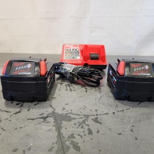 AS-IS- Milwaukee M18 18-Volt Lithium-Ion XC Starter Kit with Two 5.0Ah Batteries and Charger