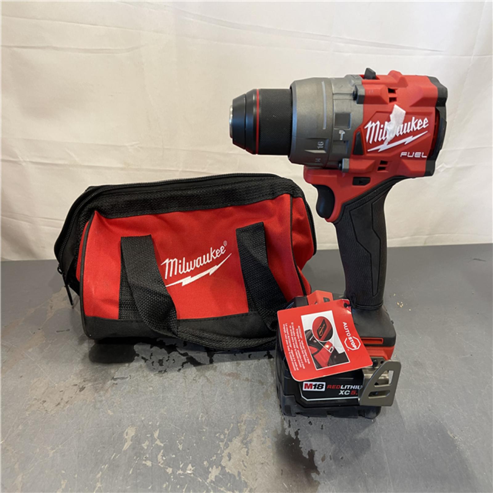 AS-IS - Milwaukee M18 FUEL 18V Lith-Ion Brushless Cordless 1/2 in. Hammer Drill/Driver w/ 5.0 Ah Battery