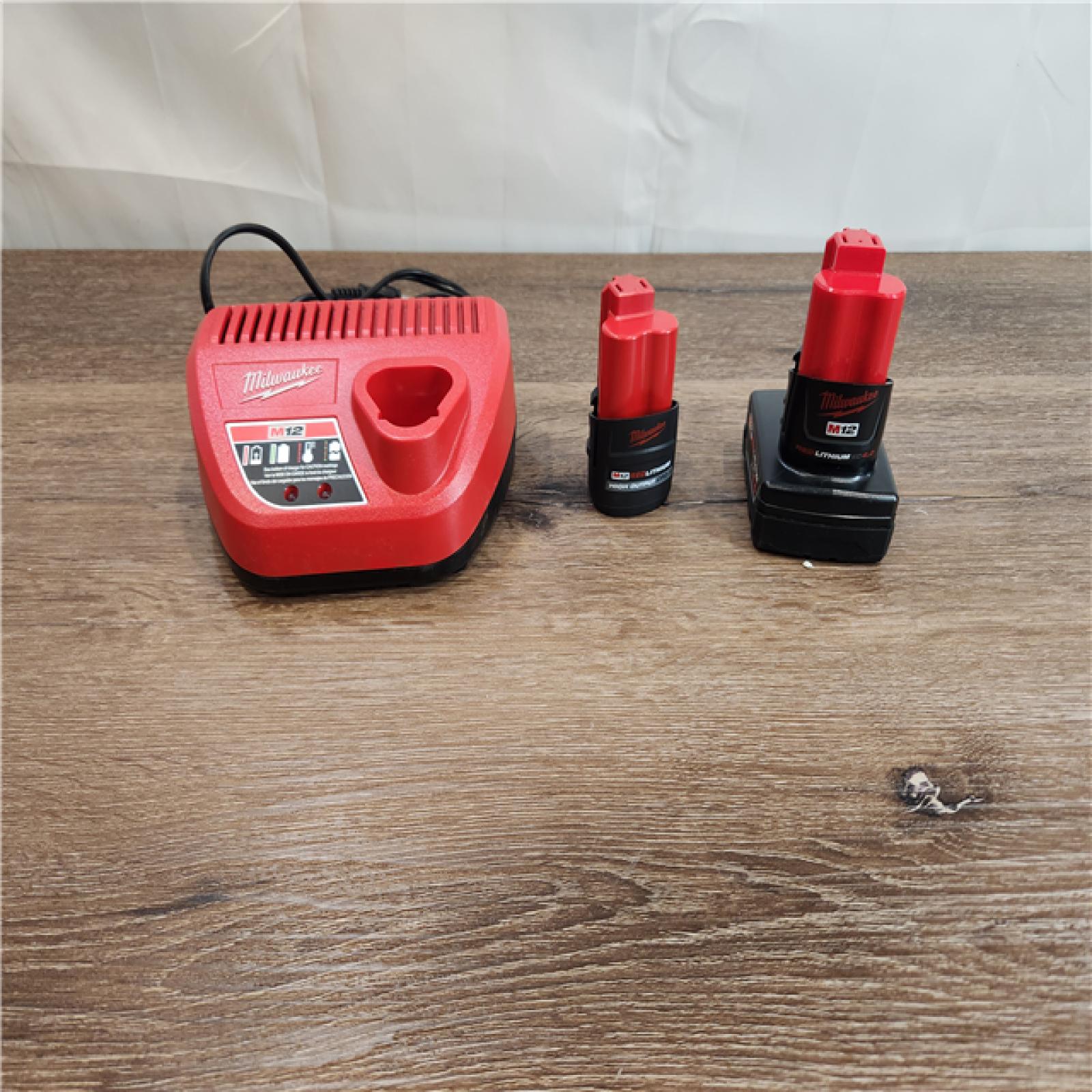 AS-IS Milwaukee M12 12-Volt Lithium-Ion High Output 5.0 Ah and 2.5  