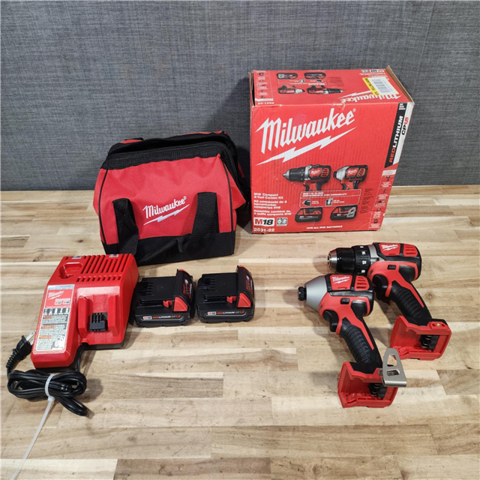 HOUSTON LOCATION - AS-IS Milwaukee 18V Lithium-Ion Cordless Drill Driver/Impact Driver Combo Kit