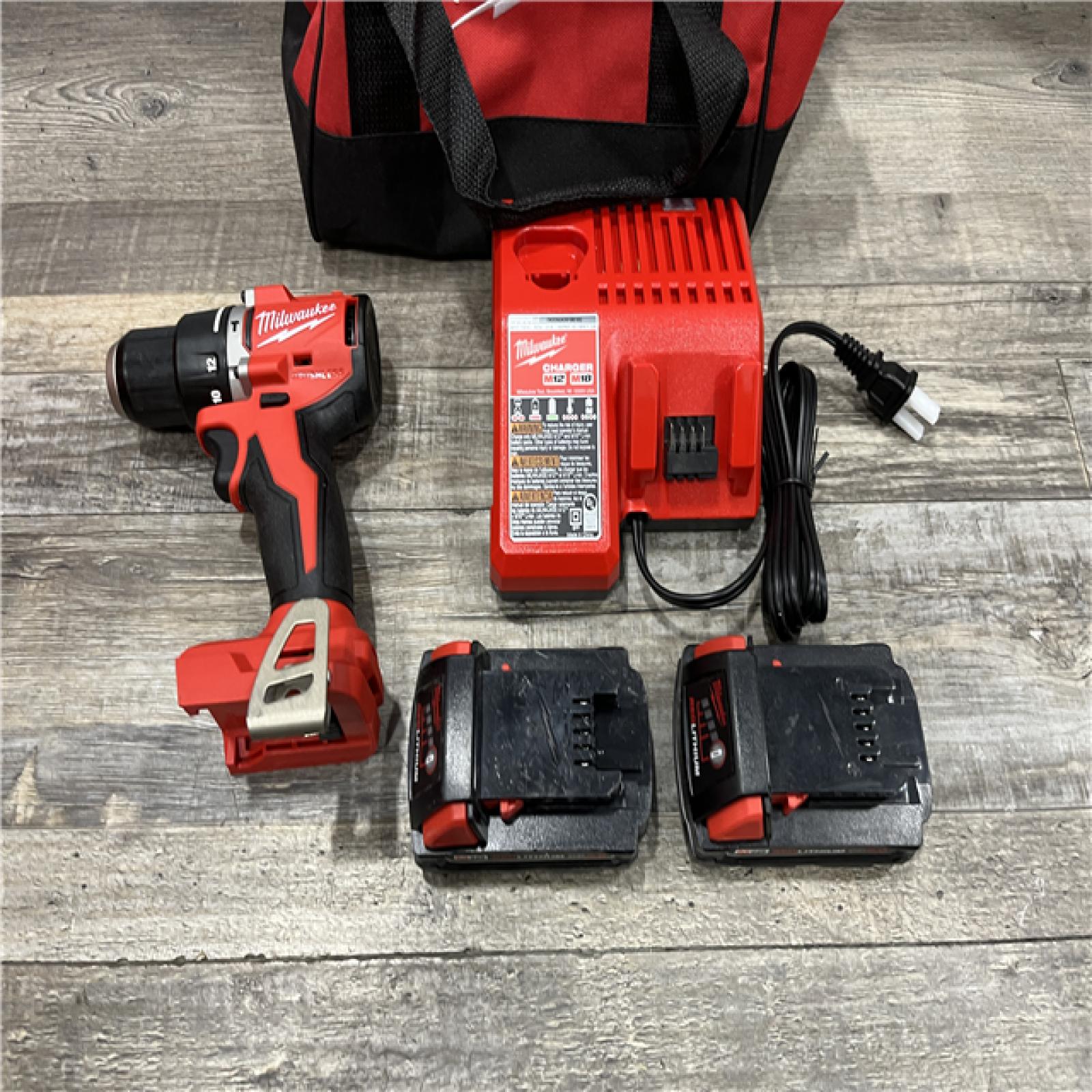 AS-IS Milwaukee 18V Lithium-Ion Brushless Cordless 1/2 in. Compact Hammer Drill/Driver Kit
