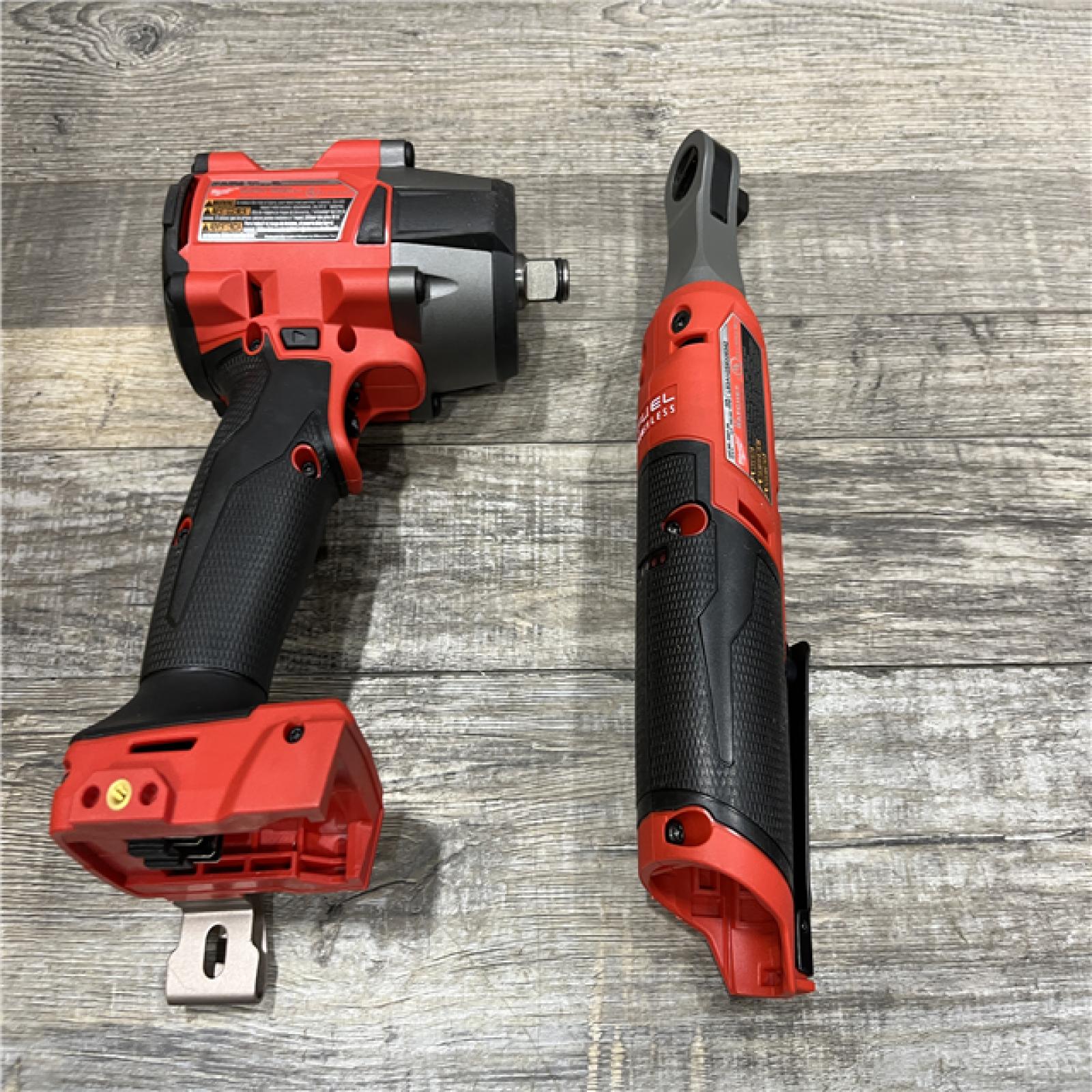 AS-IS Milwaukee FUEL 18V Cordless Mid Torque 1/2 in. Impact Wrench w/ 12 FUEL 3/8 in. Ratchet Combo Kit