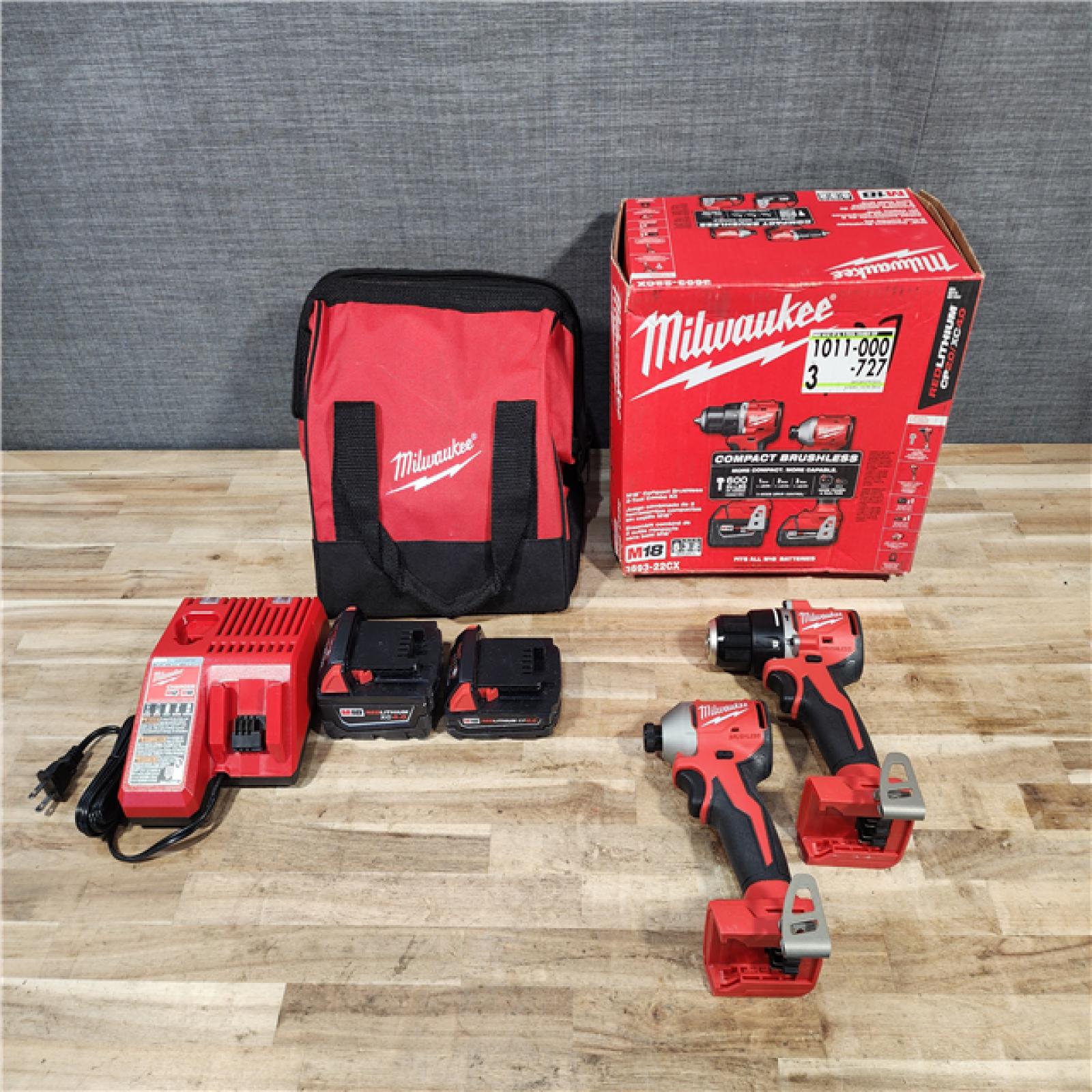 HOUSTON LOCATION - AS-IS Milwaukee 18-Volt Lithium-Ion Brushless Cordless Compact Hammer Drill/Impact Combo Kit
