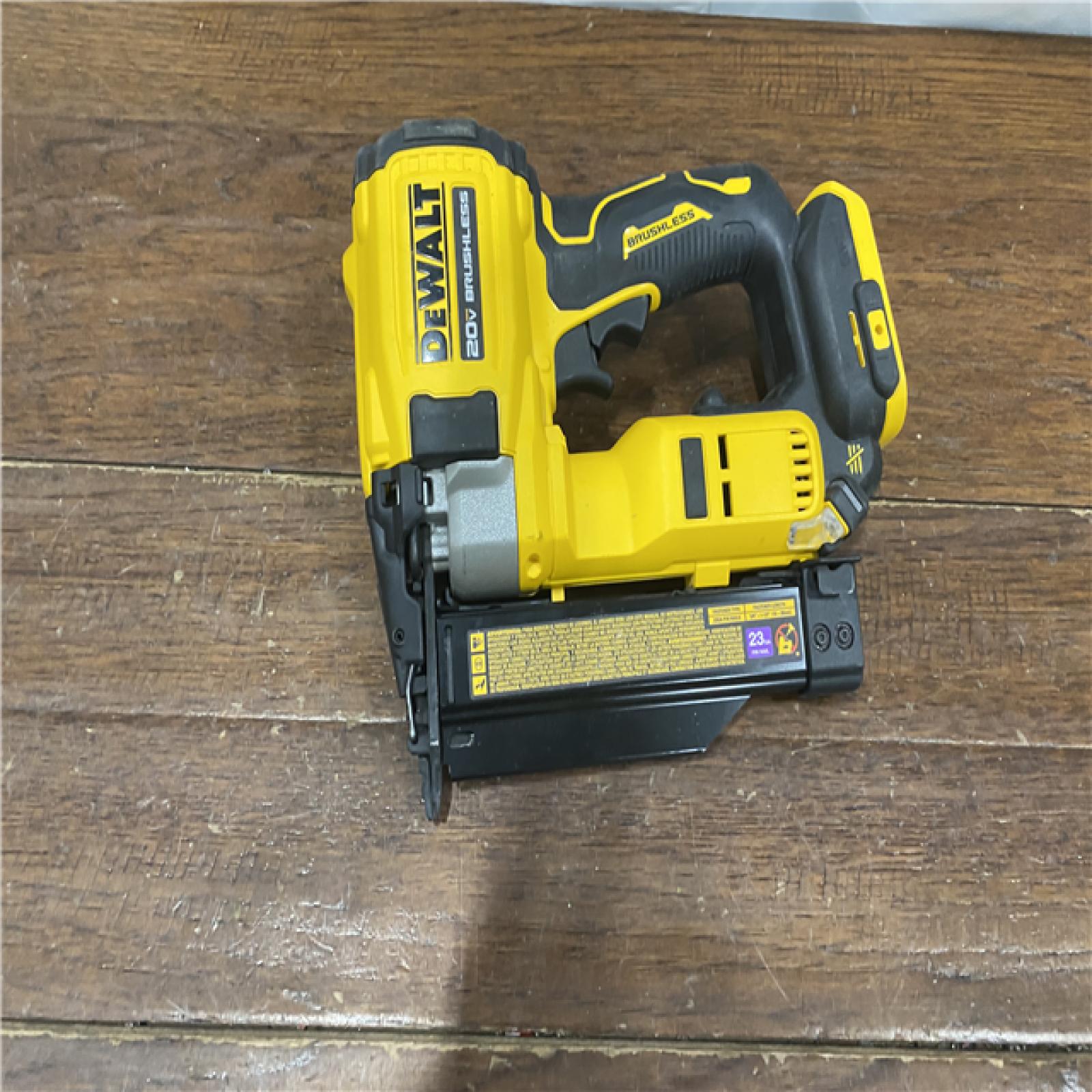 AS-IS DEWALT ATOMIC 20V MAX Lithium Ion Cordless 23 Gauge Pin Nailer Kit with 3.0Ah Battery and Charger